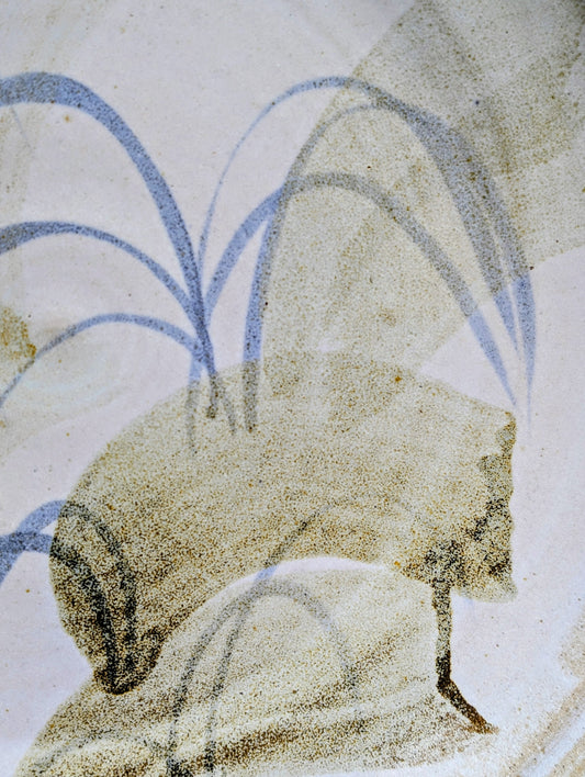 A beautifully hand-thrown studio pottery platter featuring expressive blue-gray and olive brushwork over a soft neutral glaze. Its generous size and timeless craftsmanship make it equally suited for serving, display, or as striking wall décor.