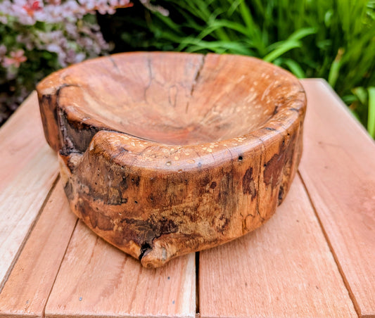 Celebrate craftsmanship and Pacific Northwest heritage with this one-of-a-kind hand-carved live edge wooden bowl. Originally commissioned as the 2013 Men's Overall Sprint Duathlon award for the Oregon Dunes Triathlon & Duathlon, it blends sculptural beauty with authentic regional history.