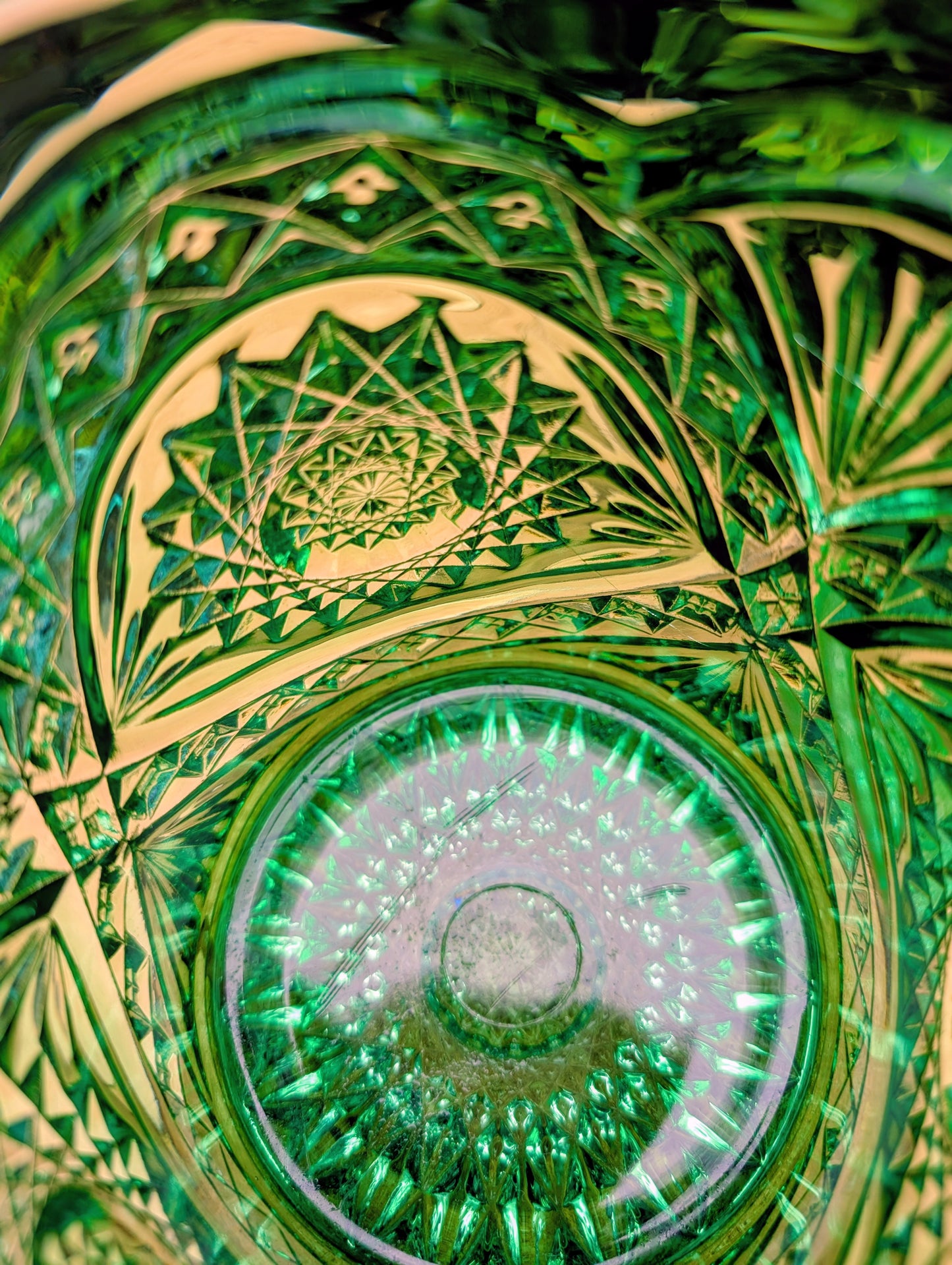 A brilliant Mid-Century collectible crafted in rich emerald pressed glass featuring Imperial's iconic Hobstar pattern.