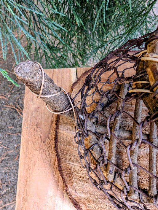 Bring the charm of handcrafted folk art into your home with this one-of-a-kind twig and wire teapot sculpture. Created from natural woodland materials, this whimsical decorative piece celebrates craftsmanship, imagination, and the beauty of nature.