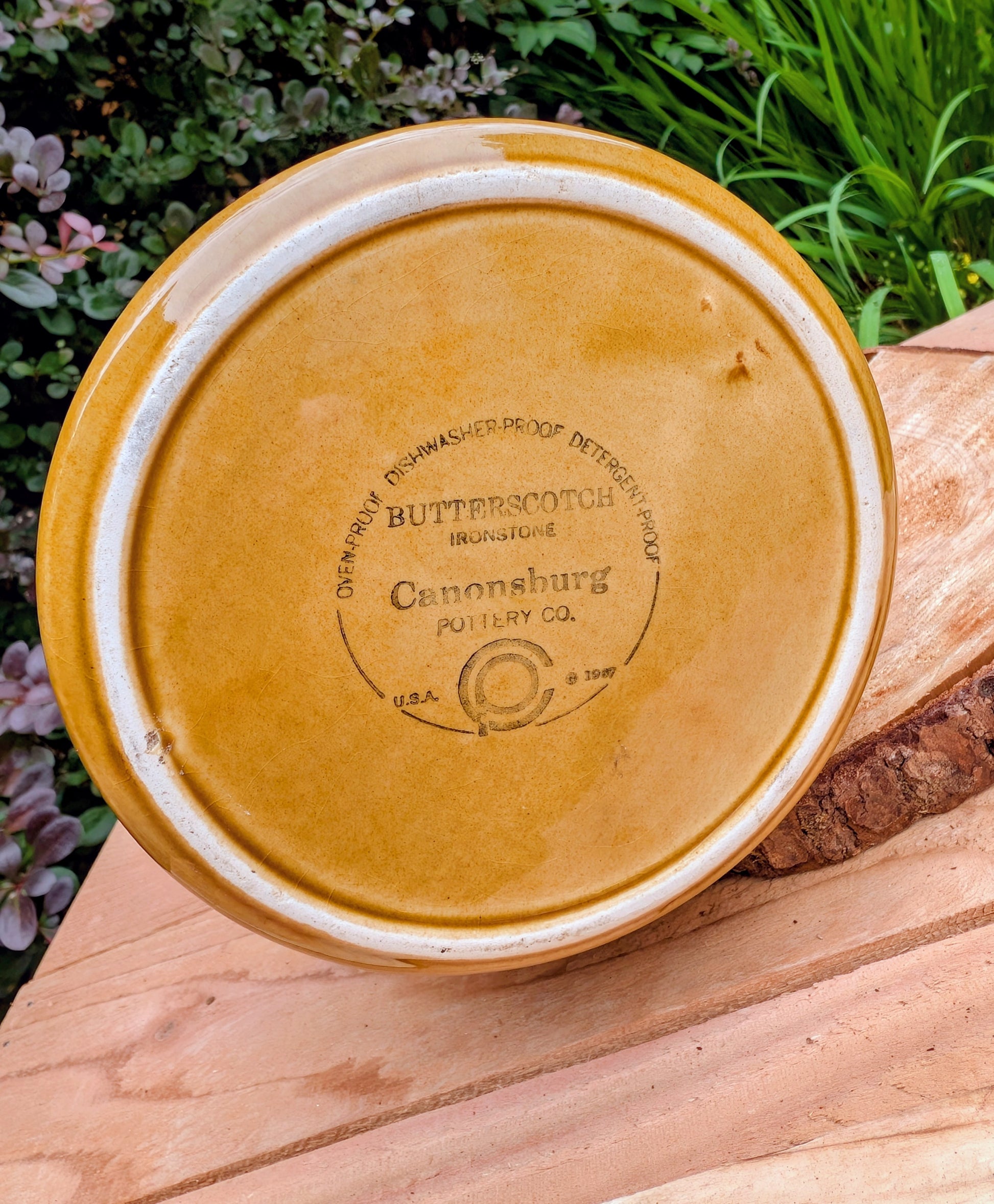 Bring timeless American craftsmanship into your home with this vintage Canonsburg Pottery Carefree Ironstone pitcher in the sought-after Butterscotch pattern. Its warm caramel glaze and signature white drip finish make it equally beautiful as a serving pitcher, floral vase, or rustic farmhouse accent.
