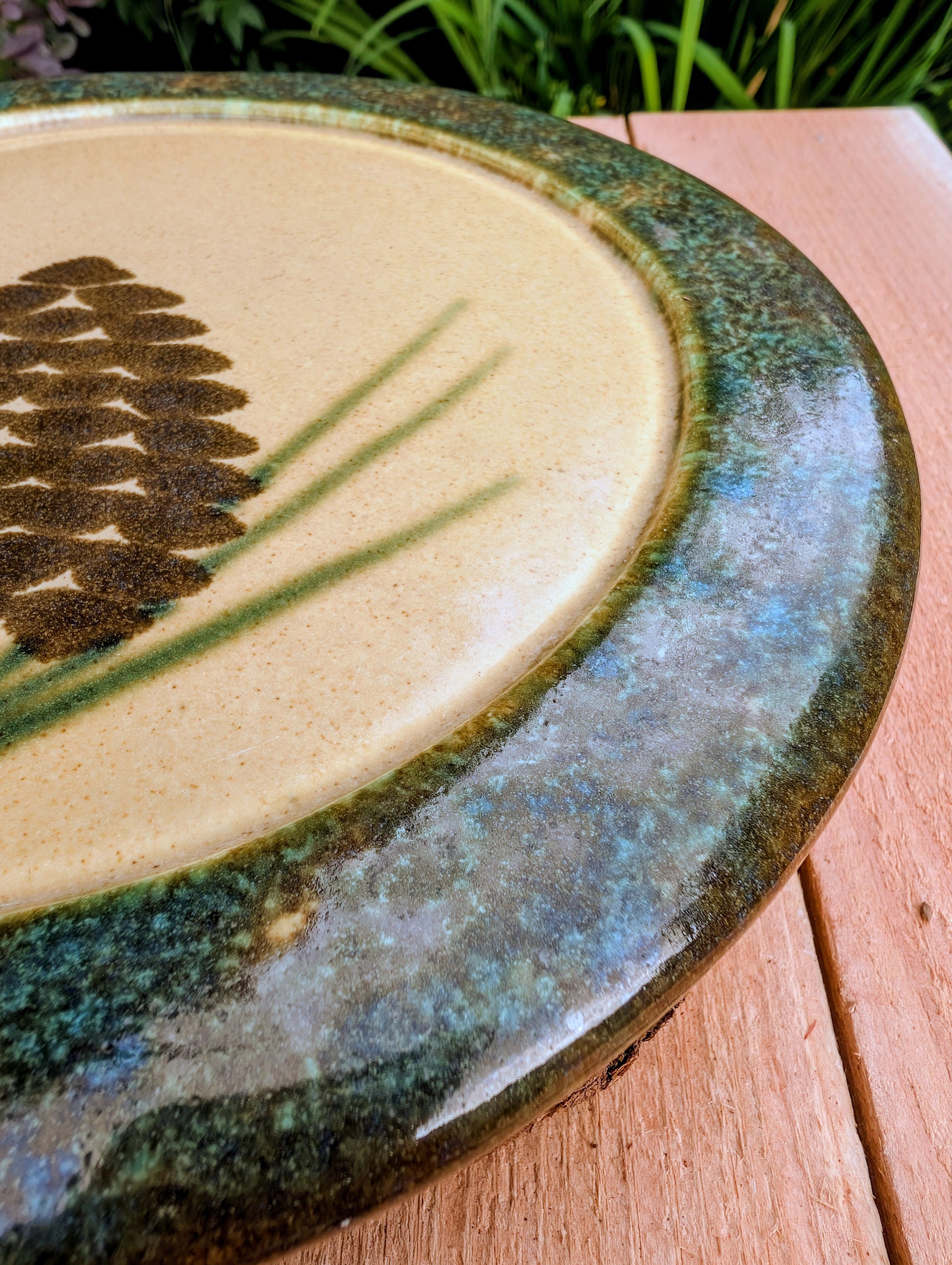 Bring the warmth of the forest to your table with this handcrafted Monroe Salt Works Pine Cone dinner plate. Featuring a classic salt-glazed finish and timeless woodland motif, this beautifully made stoneware piece blends everyday function with rustic New England craftsmanship.