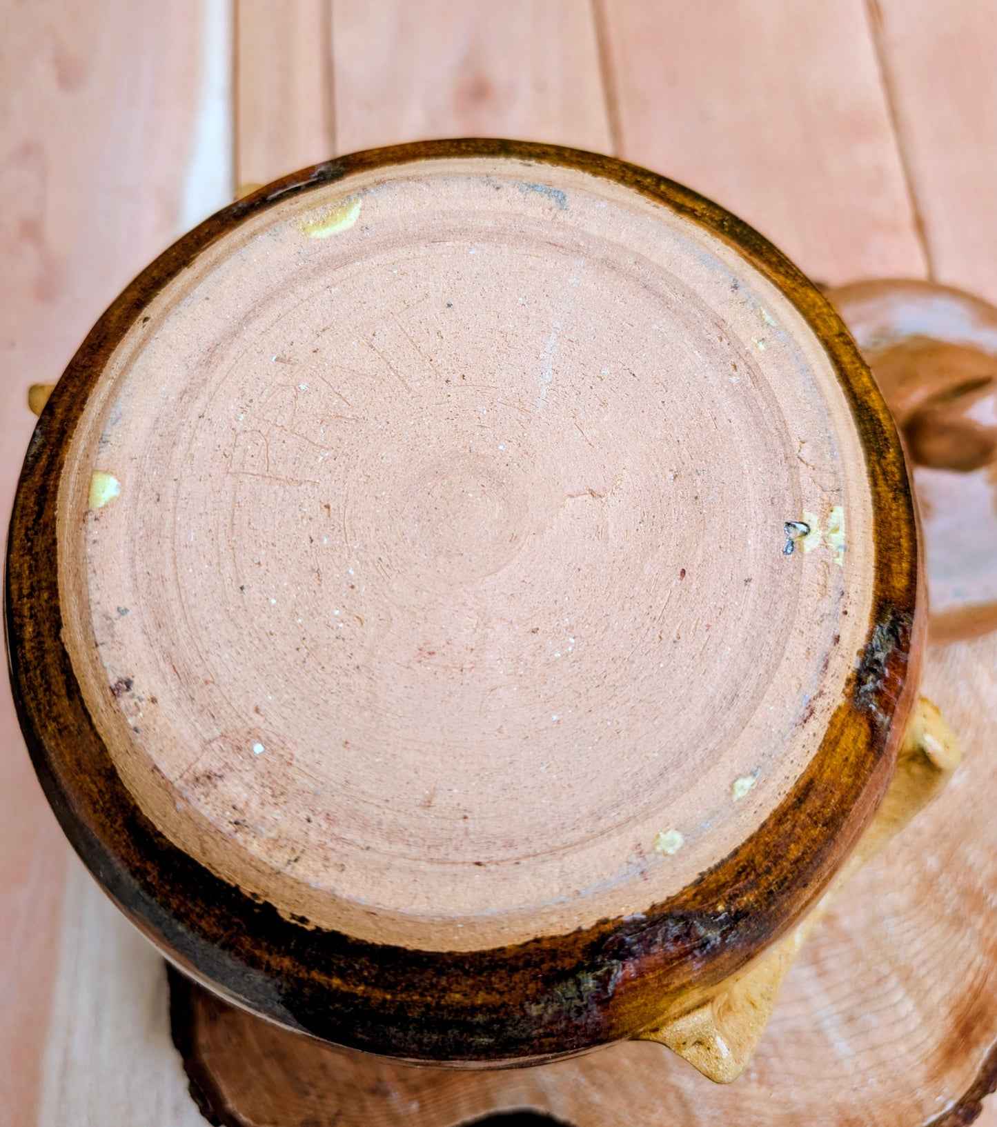 Bring timeless craftsmanship to your kitchen with this handcrafted studio pottery lidded stoneware pot. Finished in warm honey, caramel, olive, and tan glazes, this versatile covered vessel is equally beautiful as functional serveware or rustic farmhouse décor.