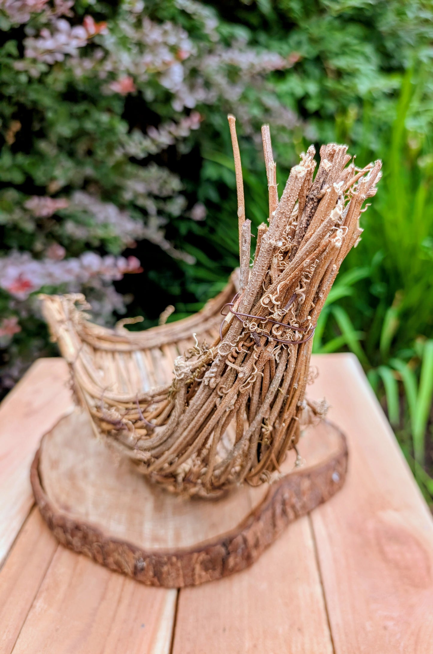 Bring the warmth of the harvest season into your home with this Napco Imports Natural Look Cornucopia. Crafted from natural grapevine and twigs over a sturdy wire frame, it makes a beautiful centerpiece for autumn decorating, seasonal displays, or rustic home décor.
