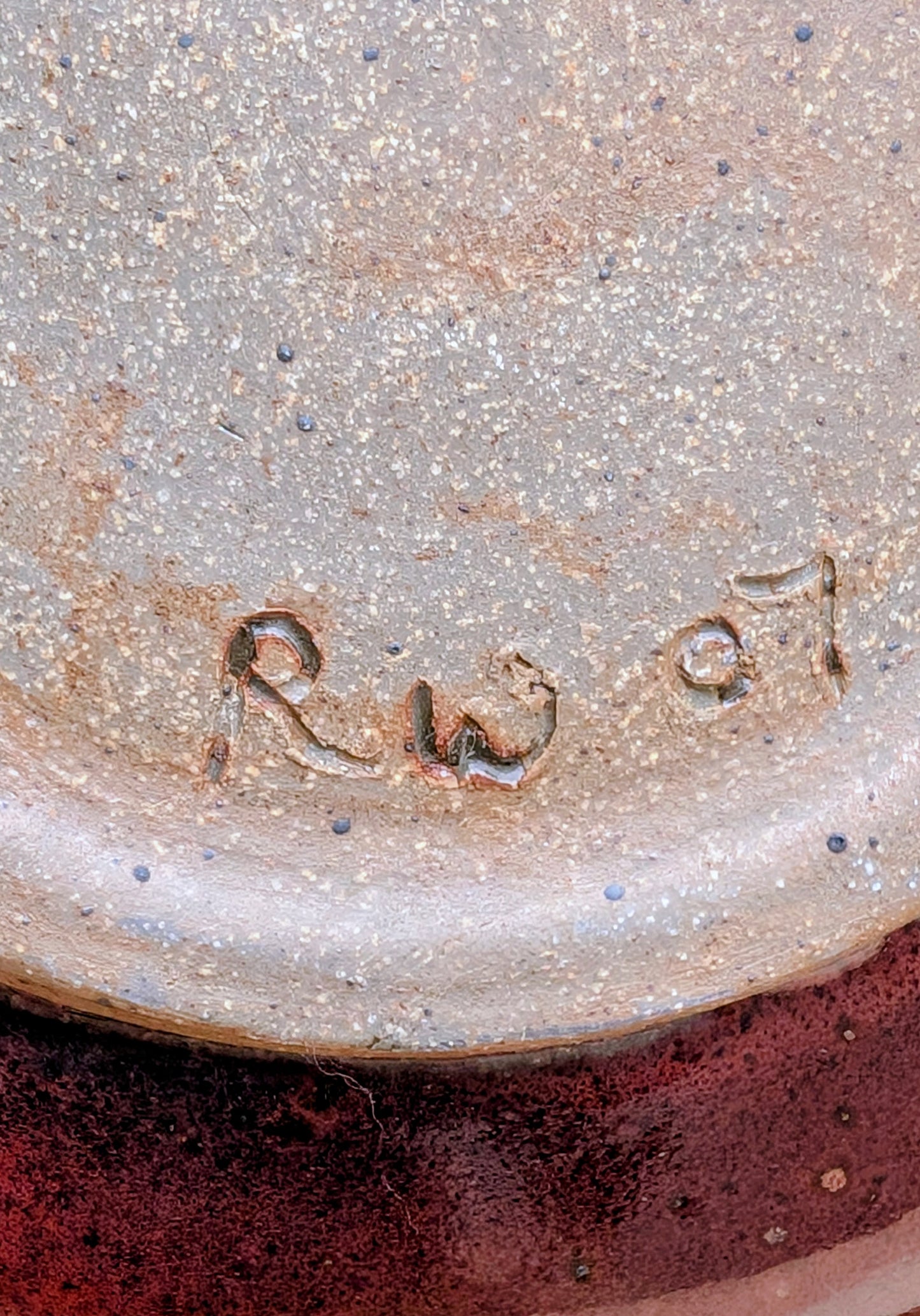 A beautifully hand-thrown studio pottery serving bowl signed and dated 1991, featuring a richly layered cobalt blue interior and deep oxblood exterior glaze. Whether used for serving or displayed as functional art, this handcrafted stoneware piece showcases the timeless beauty of American studio ceramics.