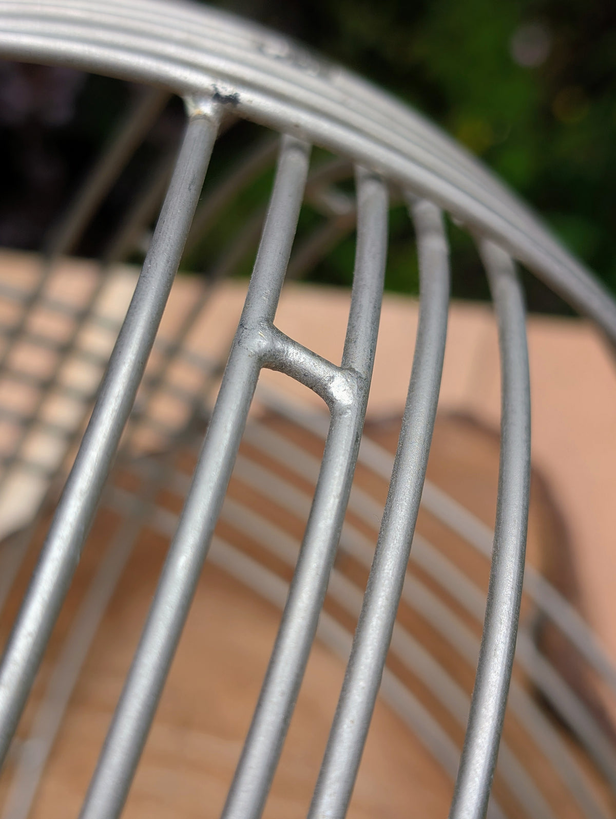 Bring sculptural simplicity to your home or garden with this stainless steel wire sphere. Its clean geometric design adds year-round visual interest, whether displayed on a tabletop, nestled among plants, or styled as a modern garden accent.