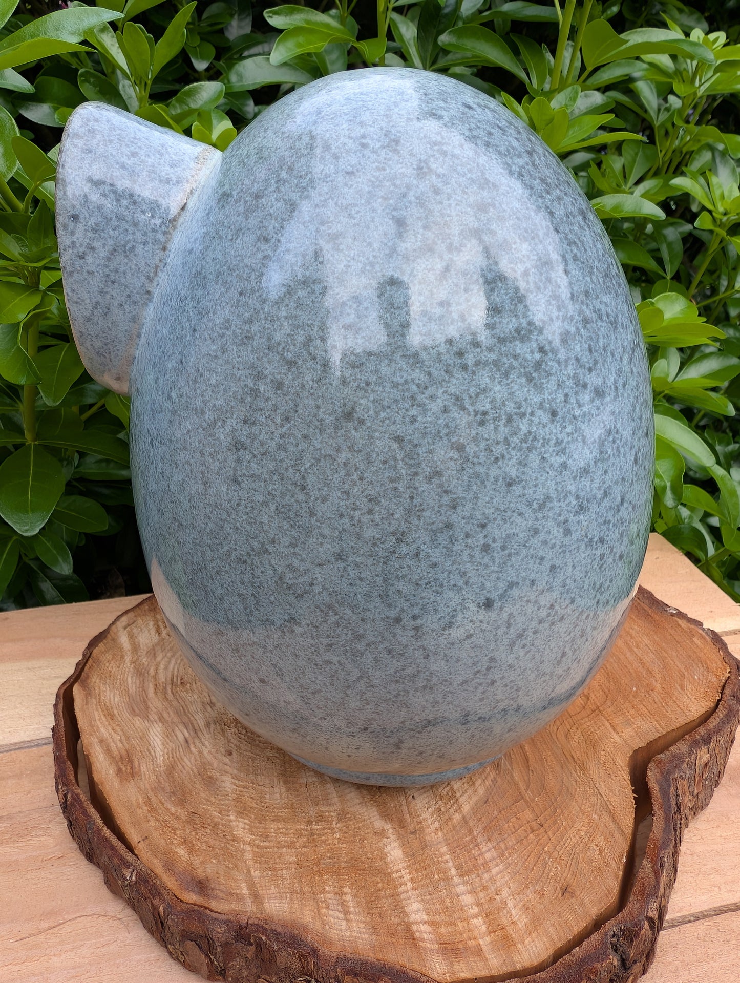 Bring sculptural beauty to your garden with the Alcyon Egg Bird Home by Byer of Maine. Its smooth glazed ceramic finish and distinctive egg-shaped design create a welcoming retreat for small birds while adding timeless charm to any outdoor space.