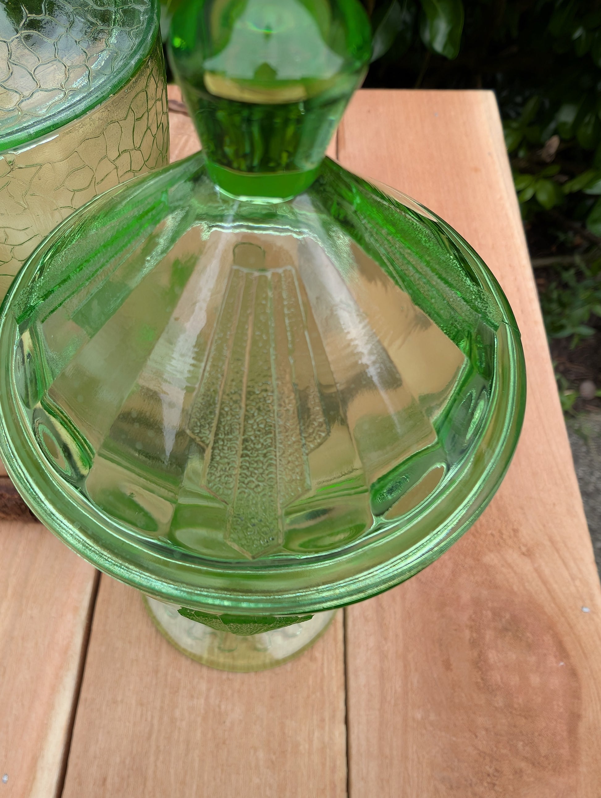 Two beautiful vintage emerald green covered pedestal candy dishes are offered in one convenient listing. Choose between a textured crackle glass design or an elegant Art Deco geometric pattern—each sold individually and carefully curated for collectors and vintage home décor enthusiasts.