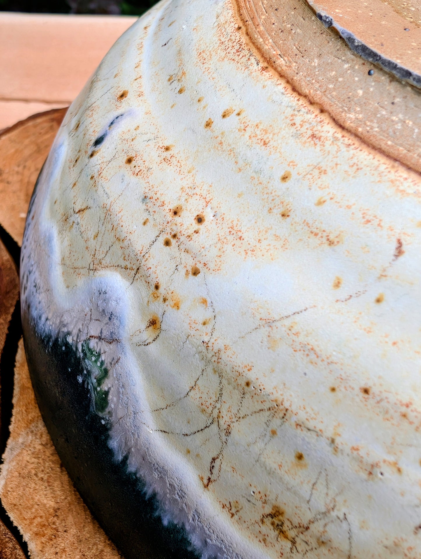 A beautifully handcrafted studio pottery bowl signed by Steve & Johnna and dated 1993. Featuring layered forest green, lavender-blue, and cream glazes, this wheel-thrown stoneware piece embodies the timeless beauty of American studio ceramics and is equally suited for everyday use or display.