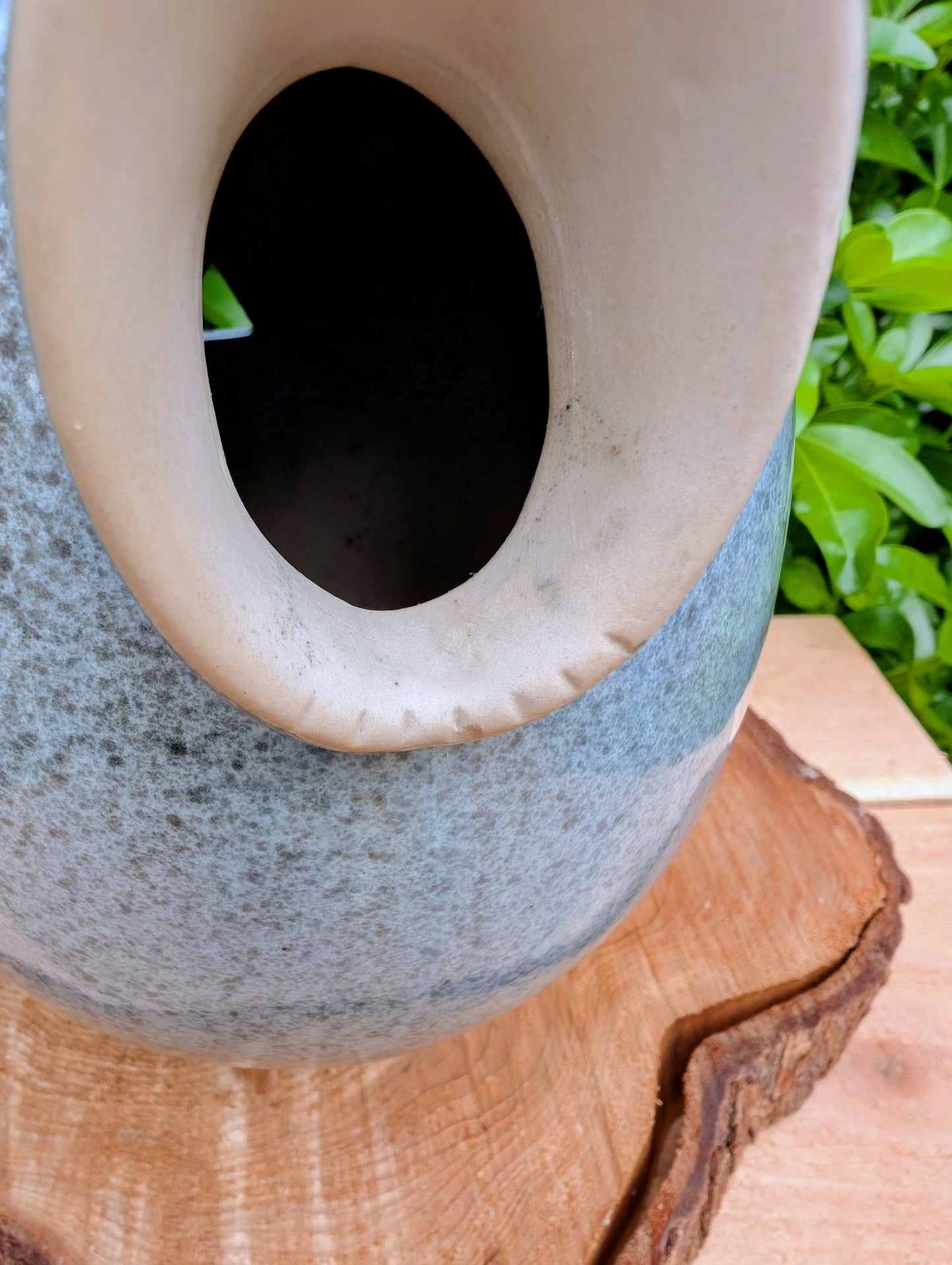 Bring sculptural beauty to your garden with the Alcyon Egg Bird Home by Byer of Maine. Its smooth glazed ceramic finish and distinctive egg-shaped design create a welcoming retreat for small birds while adding timeless charm to any outdoor space.