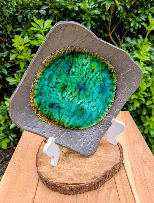 Bring the quiet beauty of Japanese ceramic artistry into your home with this vintage Yūsansai-inspired stoneware plate. Its flowing emerald, turquoise, and olive crystalline glazes make every piece uniquely expressive, perfect as a decorative centerpiece or sculptural accent.