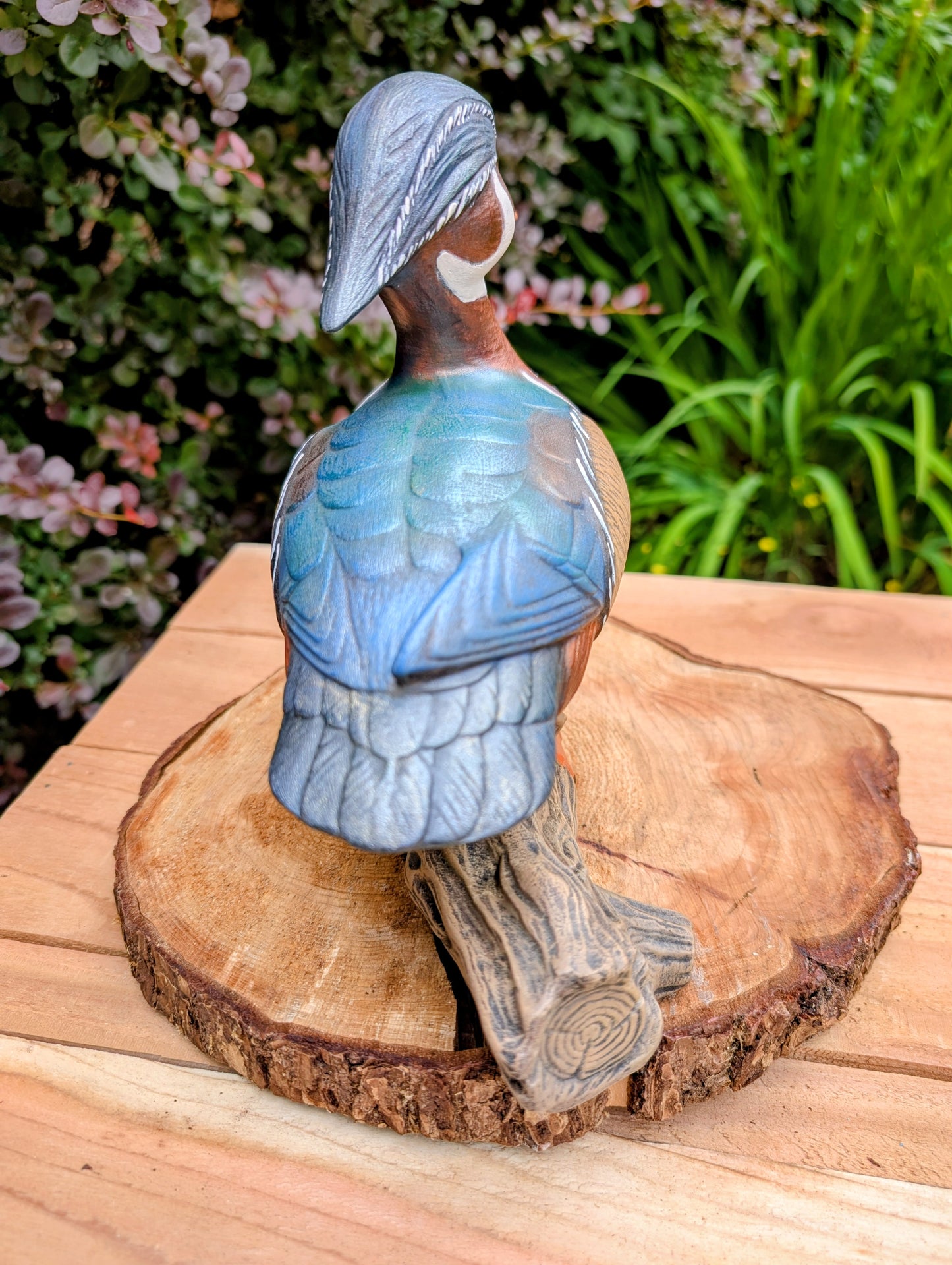 Celebrate the beauty of North American wetlands with this hand-painted ceramic Wood Duck sculpture, dated 1969 and mounted on a sculpted faux driftwood log. Richly detailed and full of rustic charm, it makes a wonderful addition to lodge, cabin, or nature-inspired décor.