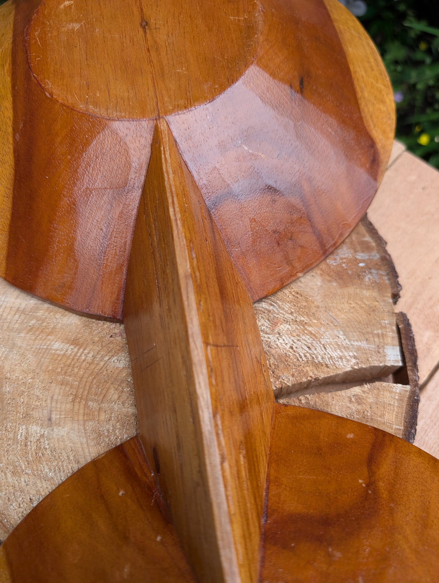 Serve with timeless style using this hand-carved Monkey Pod wood double serving tray. Crafted from a single piece of richly grained hardwood, its sculptural silhouette makes it equally beautiful as a serving piece or decorative centerpiece.