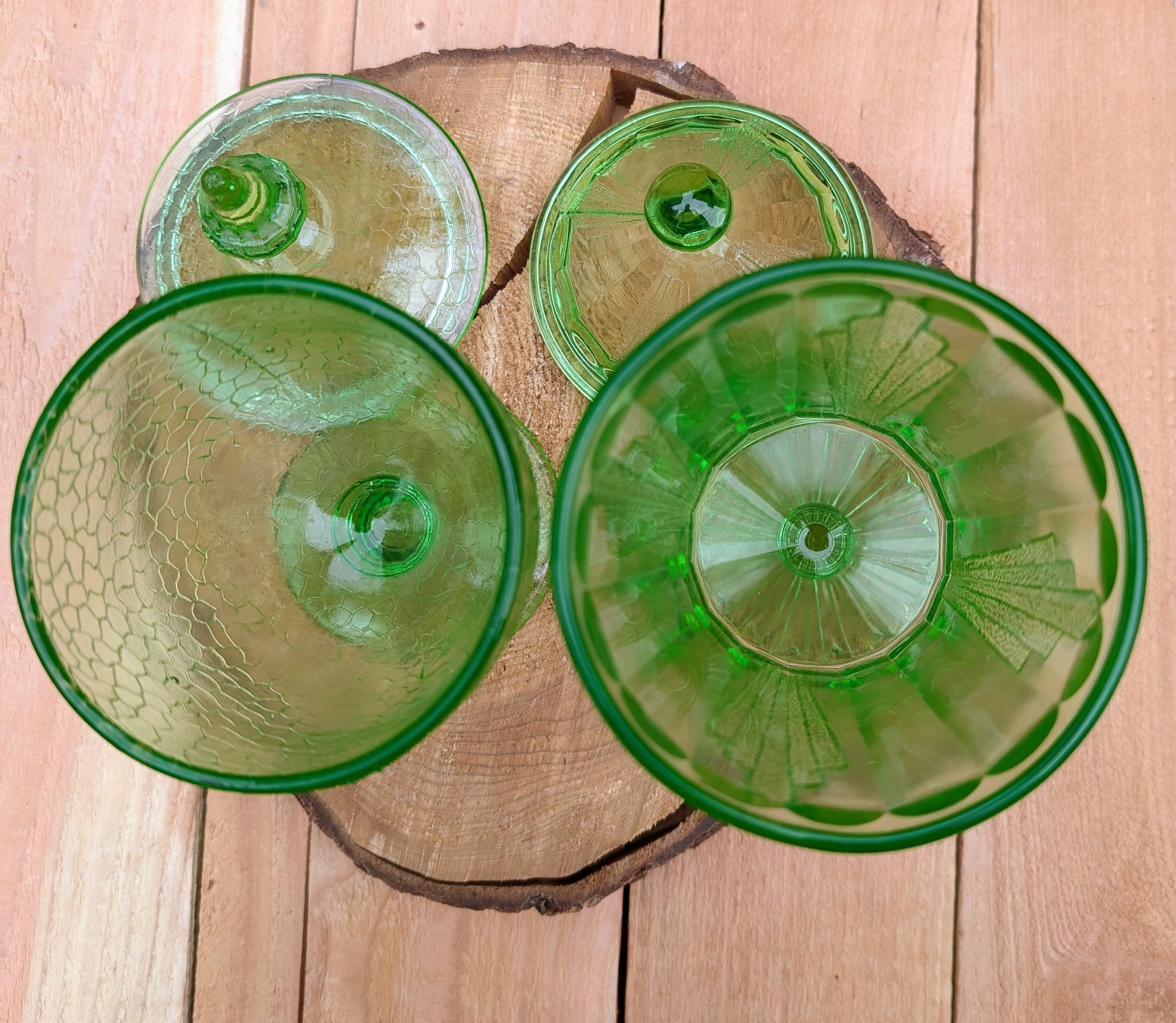 Two beautiful vintage emerald green covered pedestal candy dishes are offered in one convenient listing. Choose between a textured crackle glass design or an elegant Art Deco geometric pattern—each sold individually and carefully curated for collectors and vintage home décor enthusiasts.