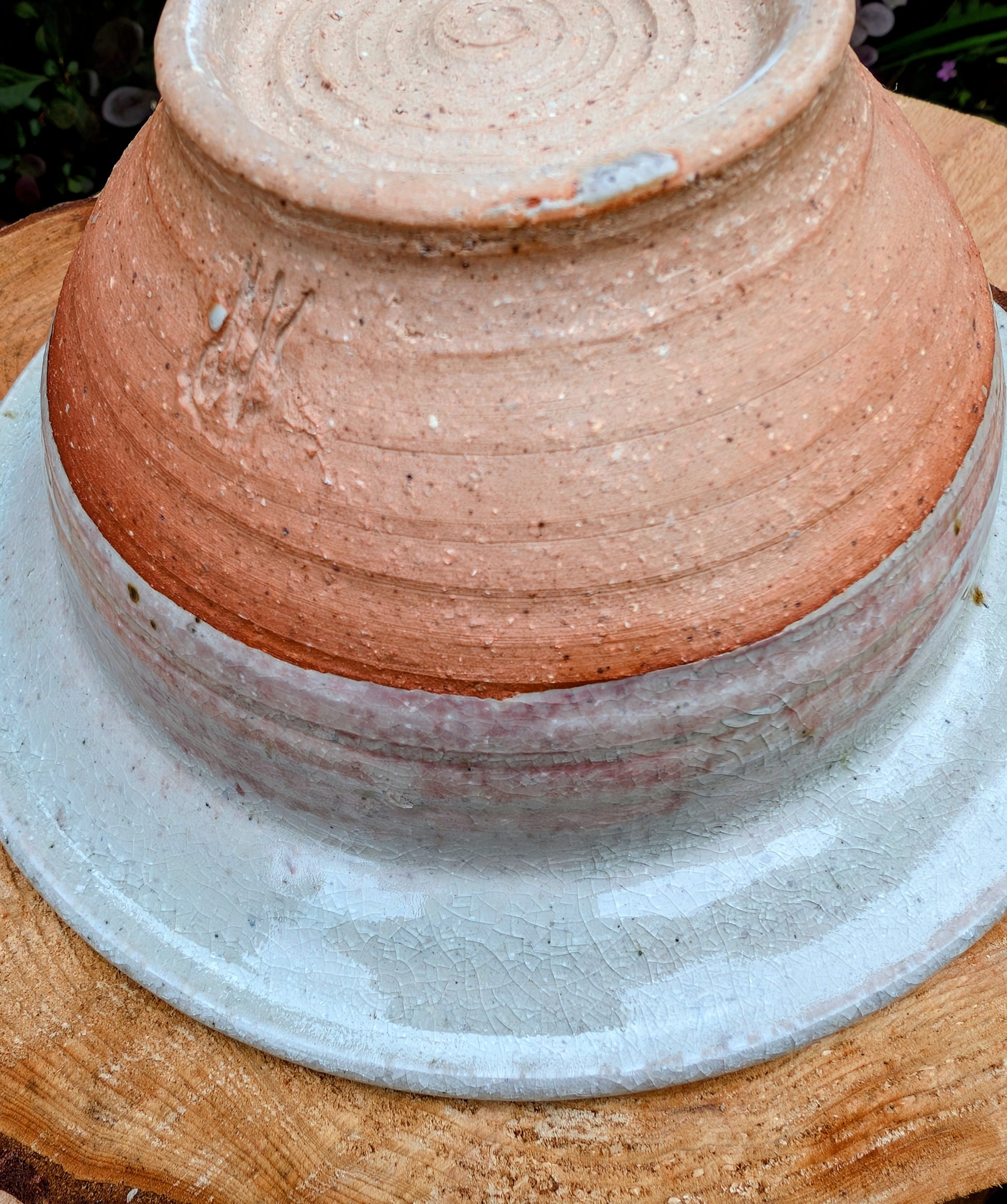 Handcrafted with timeless simplicity, this signed studio pottery serving bowl pairs a soft celadon-gray glaze with a warm iron-rich stoneware body. Its versatile size and understated design make it equally beautiful for serving, display, or everyday living.