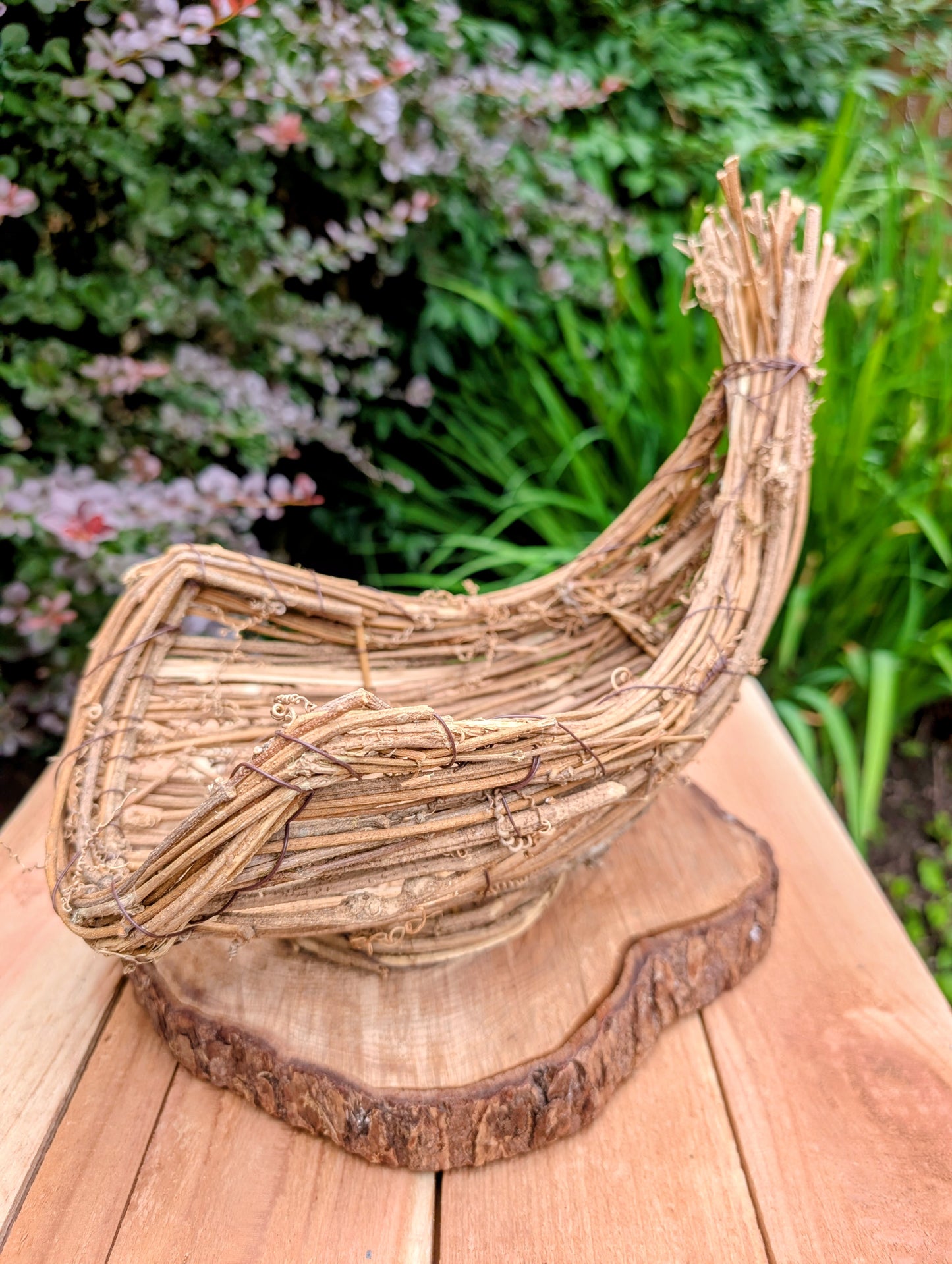 Bring the warmth of the harvest season into your home with this Napco Imports Natural Look Cornucopia. Crafted from natural grapevine and twigs over a sturdy wire frame, it makes a beautiful centerpiece for autumn decorating, seasonal displays, or rustic home décor.