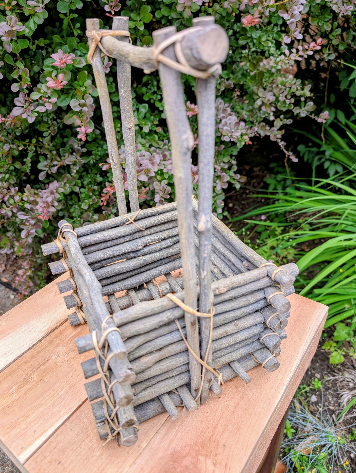 A beautifully handcrafted twig gathering basket that brings rustic warmth and natural texture to your home or garden. Perfect for displaying potted plants, seasonal décor, dried botanicals, or everyday storage, this versatile basket celebrates timeless craftsmanship and Pacific Northwest-inspired living.