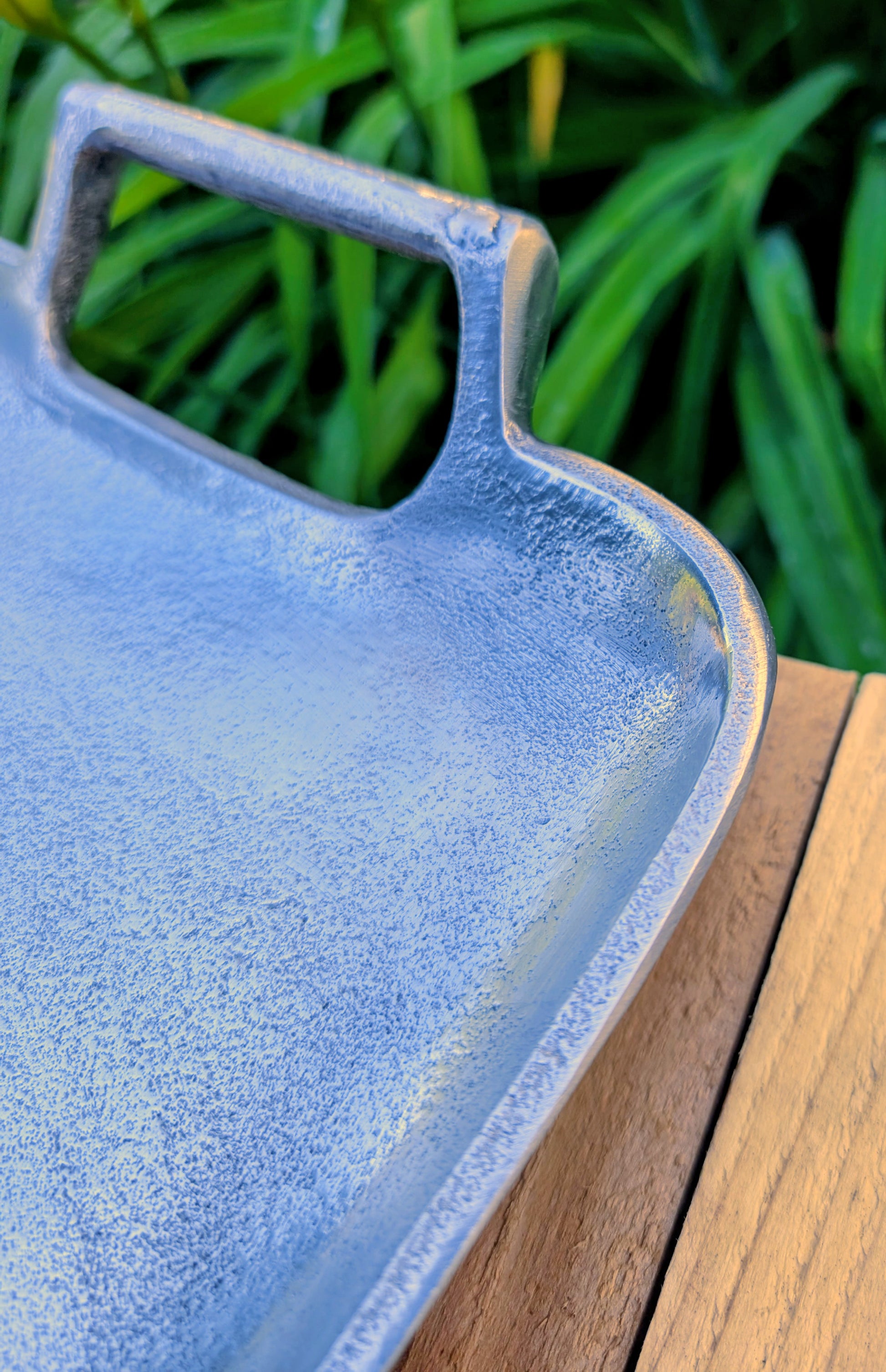 Bring timeless elegance to your garden or home with this vintage cast aluminum serving tray featuring a beautiful satin pewter finish and integrated handles. Originally designed for entertaining, it has been thoughtfully curated by Cedar & Song Studio as a versatile bird feeding tray, centerpiece, or decorative serving piece.