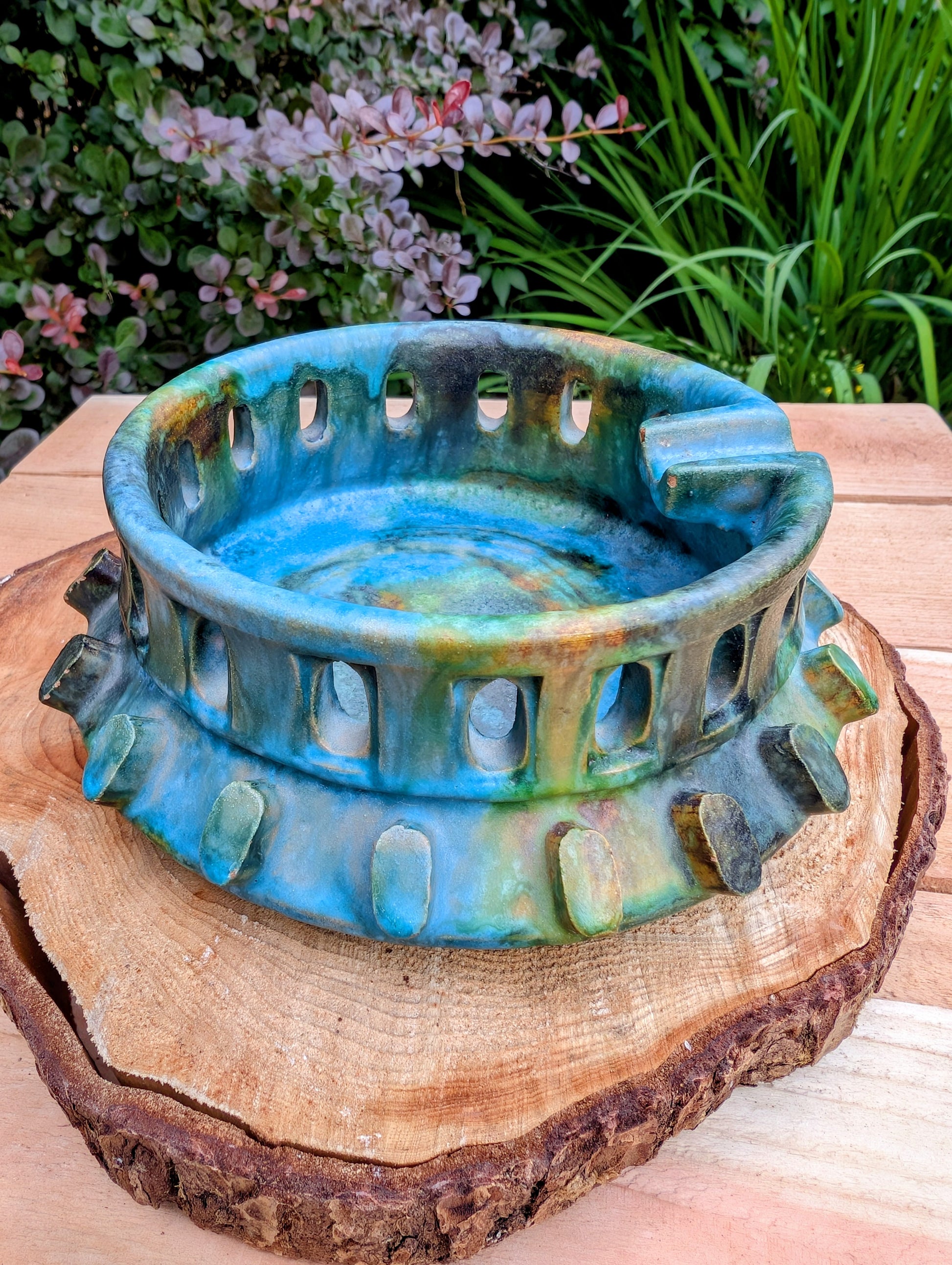 An authentic Alvino Bagni Italian art pottery ashtray, attributed to the celebrated Sea Garden collection produced for the American market through Raymor during the late 1960s. Its richly layered volcanic glaze and sculptural form make it equally stunning as a decorative bowl, catchall, or collectible Mid-Century Modern accent.