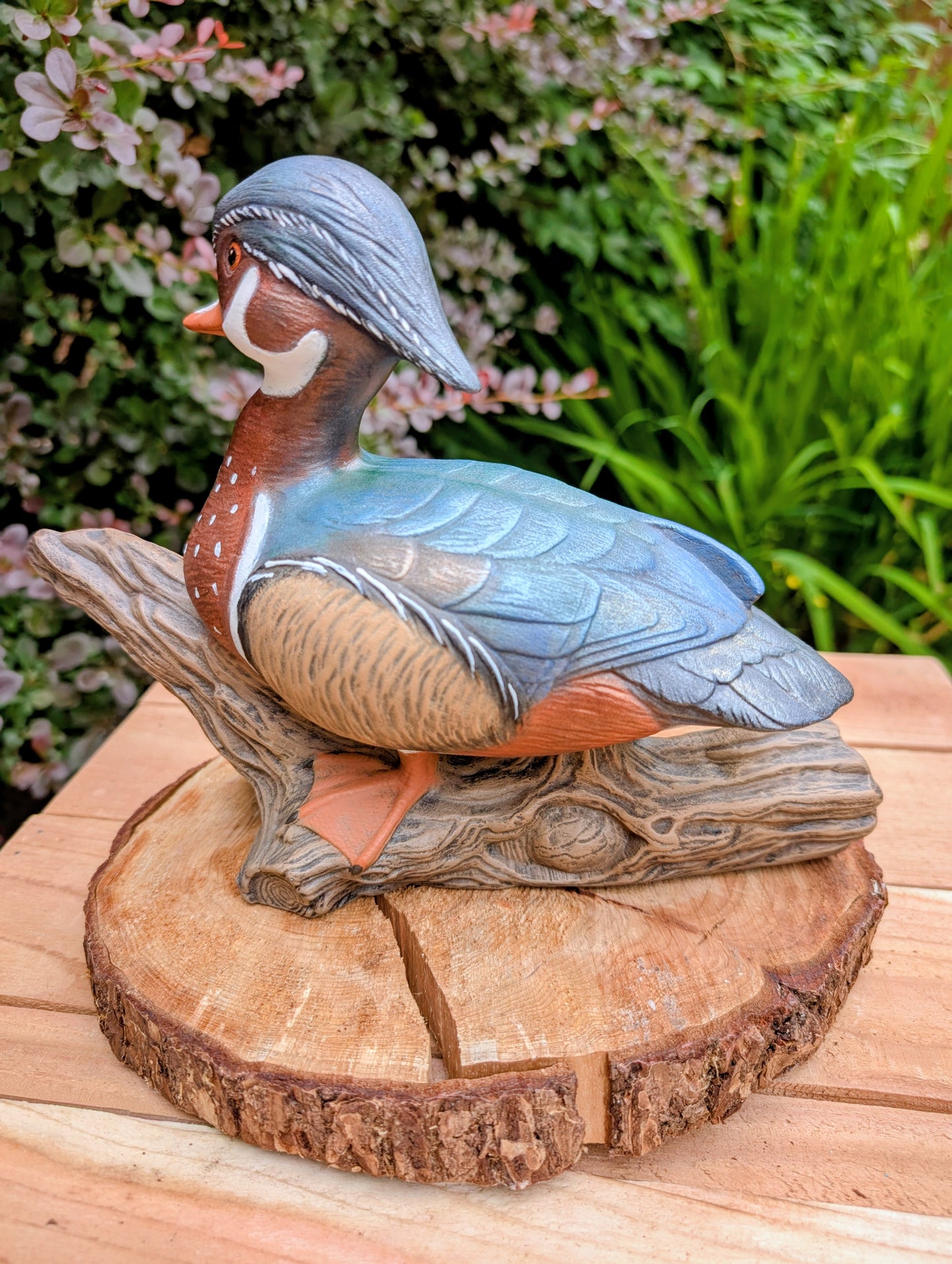 Celebrate the beauty of North American wetlands with this hand-painted ceramic Wood Duck sculpture, dated 1969 and mounted on a sculpted faux driftwood log. Richly detailed and full of rustic charm, it makes a wonderful addition to lodge, cabin, or nature-inspired décor.