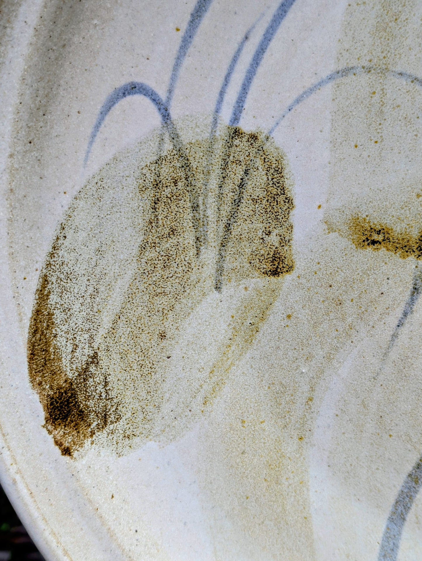 A beautifully hand-thrown studio pottery platter featuring expressive blue-gray and olive brushwork over a soft neutral glaze. Its generous size and timeless craftsmanship make it equally suited for serving, display, or as striking wall décor.