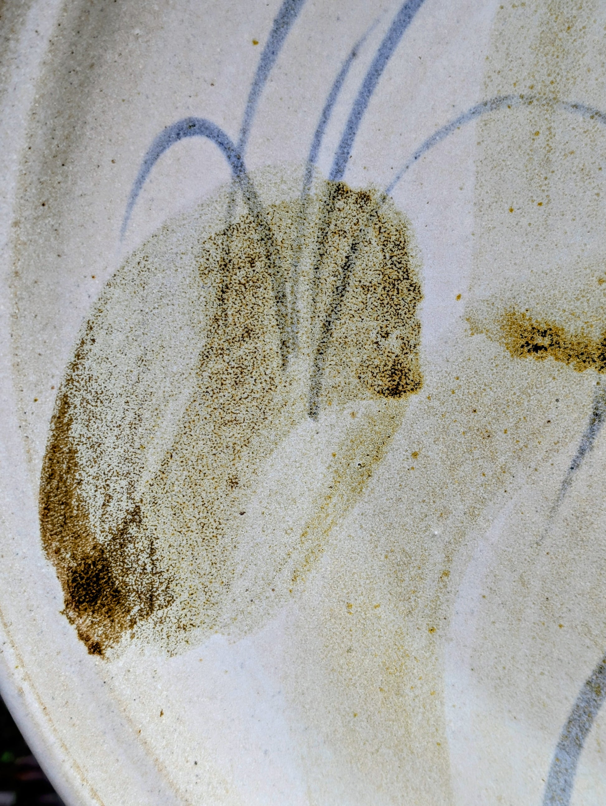 A beautifully hand-thrown studio pottery platter featuring expressive blue-gray and olive brushwork over a soft neutral glaze. Its generous size and timeless craftsmanship make it equally suited for serving, display, or as striking wall décor.