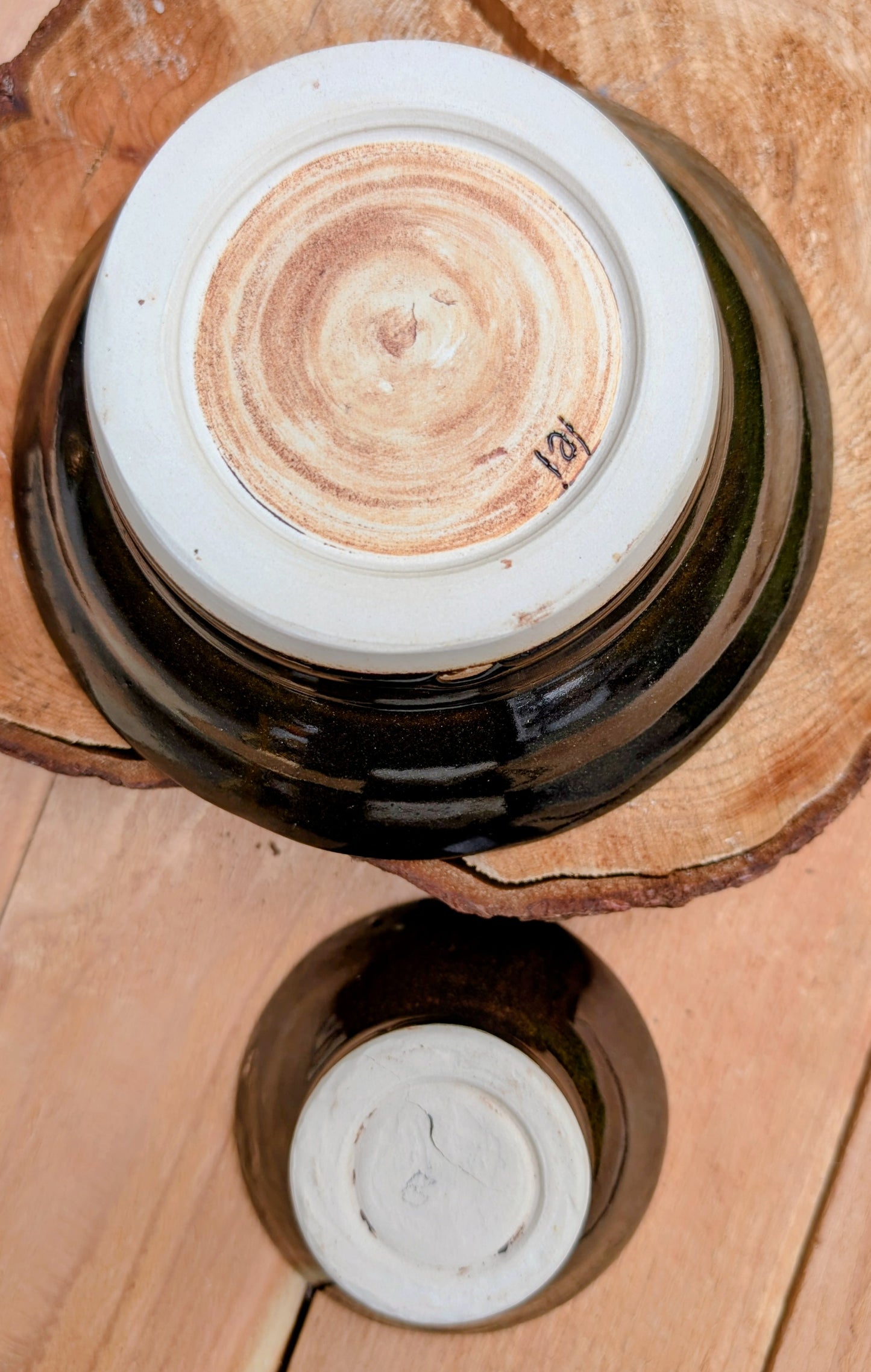 This coordinating set of two handmade studio pottery bowls showcases beautiful reactive glazes and timeless artisan craftsmanship. Perfect for serving, displaying, or gifting, the complementary designs bring warmth and organic character to any home.