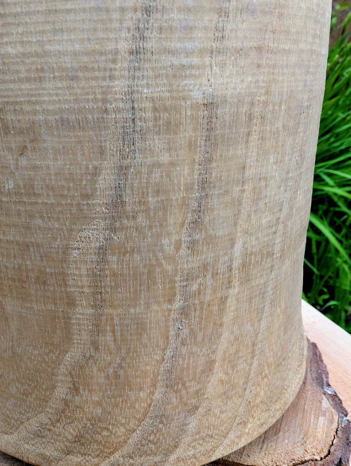 Bring natural warmth and organic texture into your home with this hand-carved paulownia wood footed vase. Its sculptural silhouette and unfinished wood grain make it a timeless accent for dried botanicals, seasonal branches, or as a beautiful standalone decorative piece.