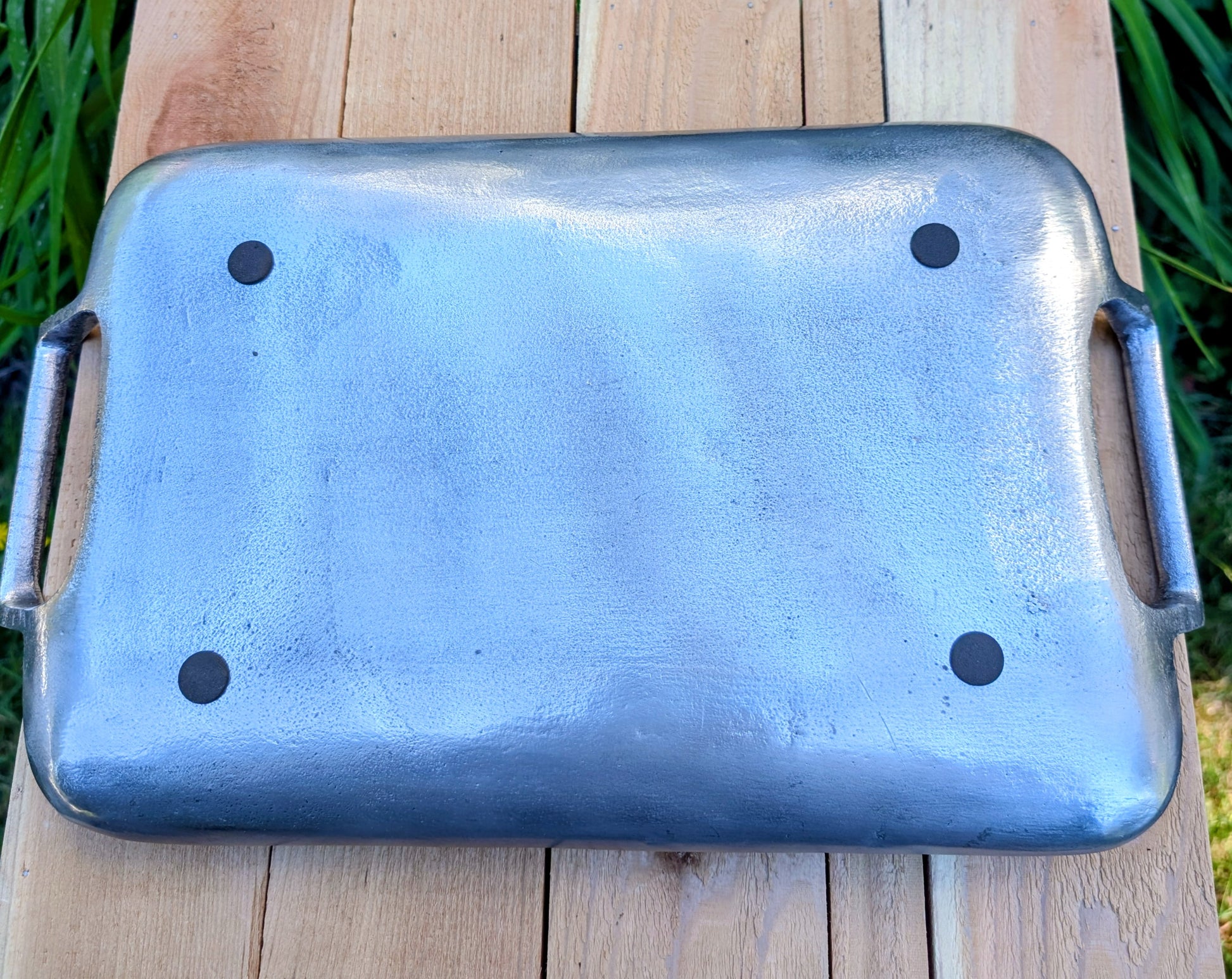 Bring timeless elegance to your garden or home with this vintage cast aluminum serving tray featuring a beautiful satin pewter finish and integrated handles. Originally designed for entertaining, it has been thoughtfully curated by Cedar & Song Studio as a versatile bird feeding tray, centerpiece, or decorative serving piece.