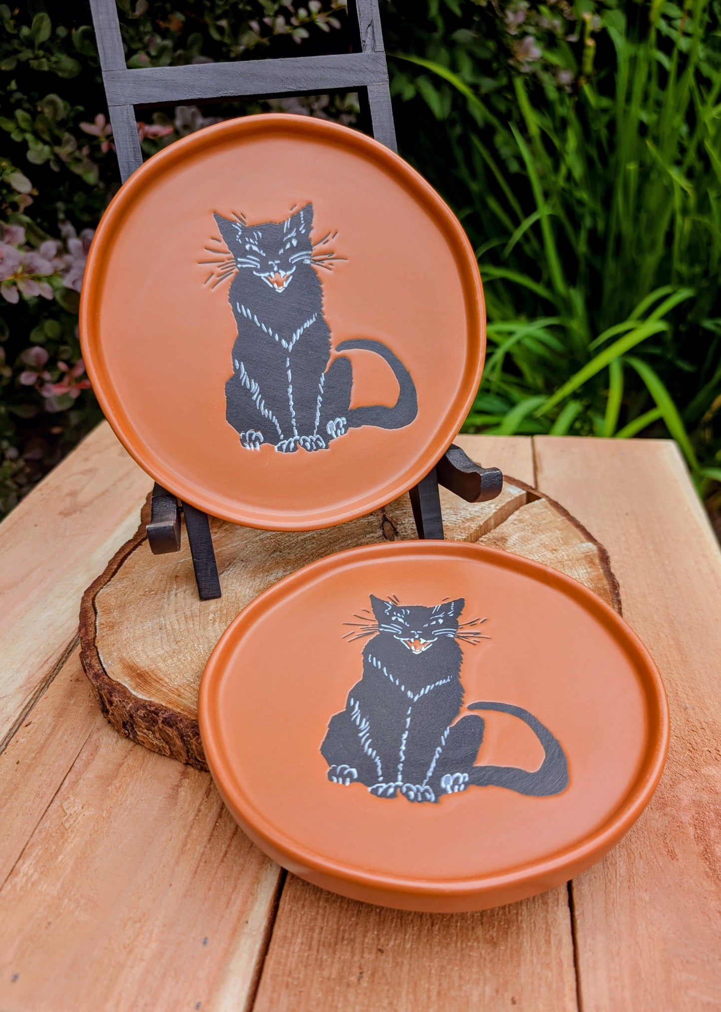 Celebrate the cozy charm of autumn with this whimsical Threshold™ Black Cat Stoneware Plate. Perfect as a snack plate, jewelry dish, decorative coaster, or seasonal accent, each plate is sold individually, with a matching pair available while supplies last.