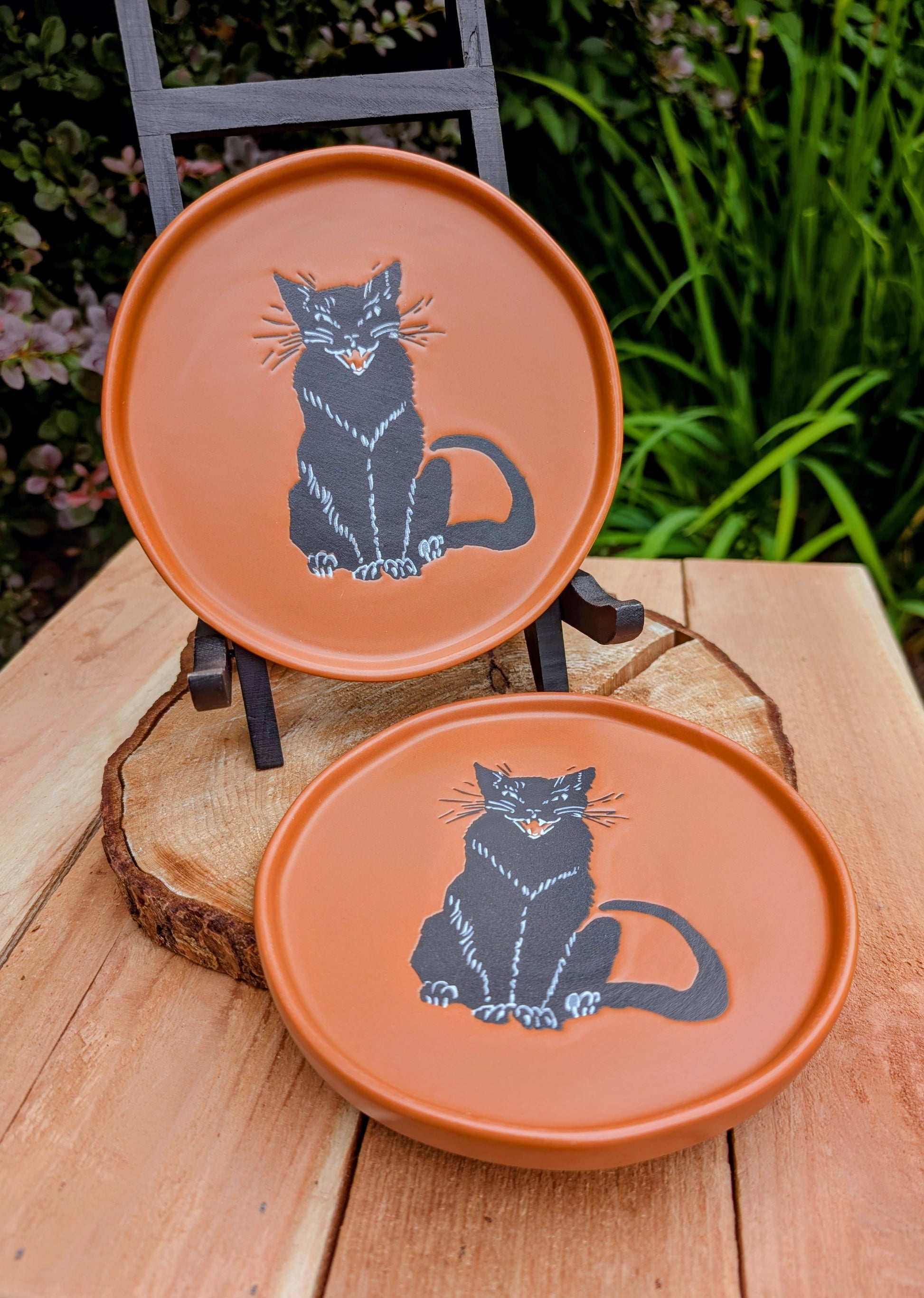 Celebrate the cozy charm of autumn with this whimsical Threshold™ Black Cat Stoneware Plate. Perfect as a snack plate, jewelry dish, decorative coaster, or seasonal accent, each plate is sold individually, with a matching pair available while supplies last.