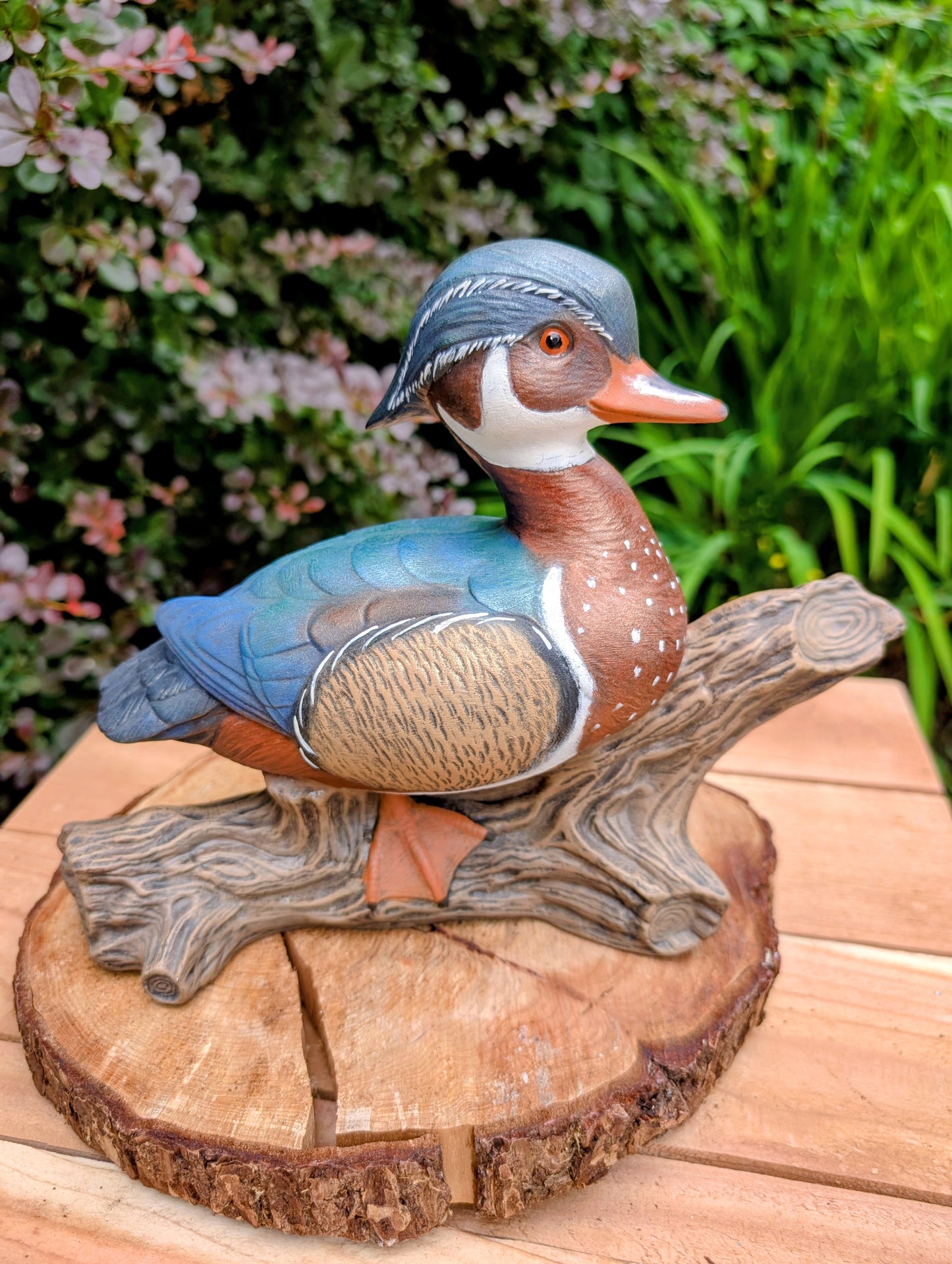 Celebrate the beauty of North American wetlands with this hand-painted ceramic Wood Duck sculpture, dated 1969 and mounted on a sculpted faux driftwood log. Richly detailed and full of rustic charm, it makes a wonderful addition to lodge, cabin, or nature-inspired décor.