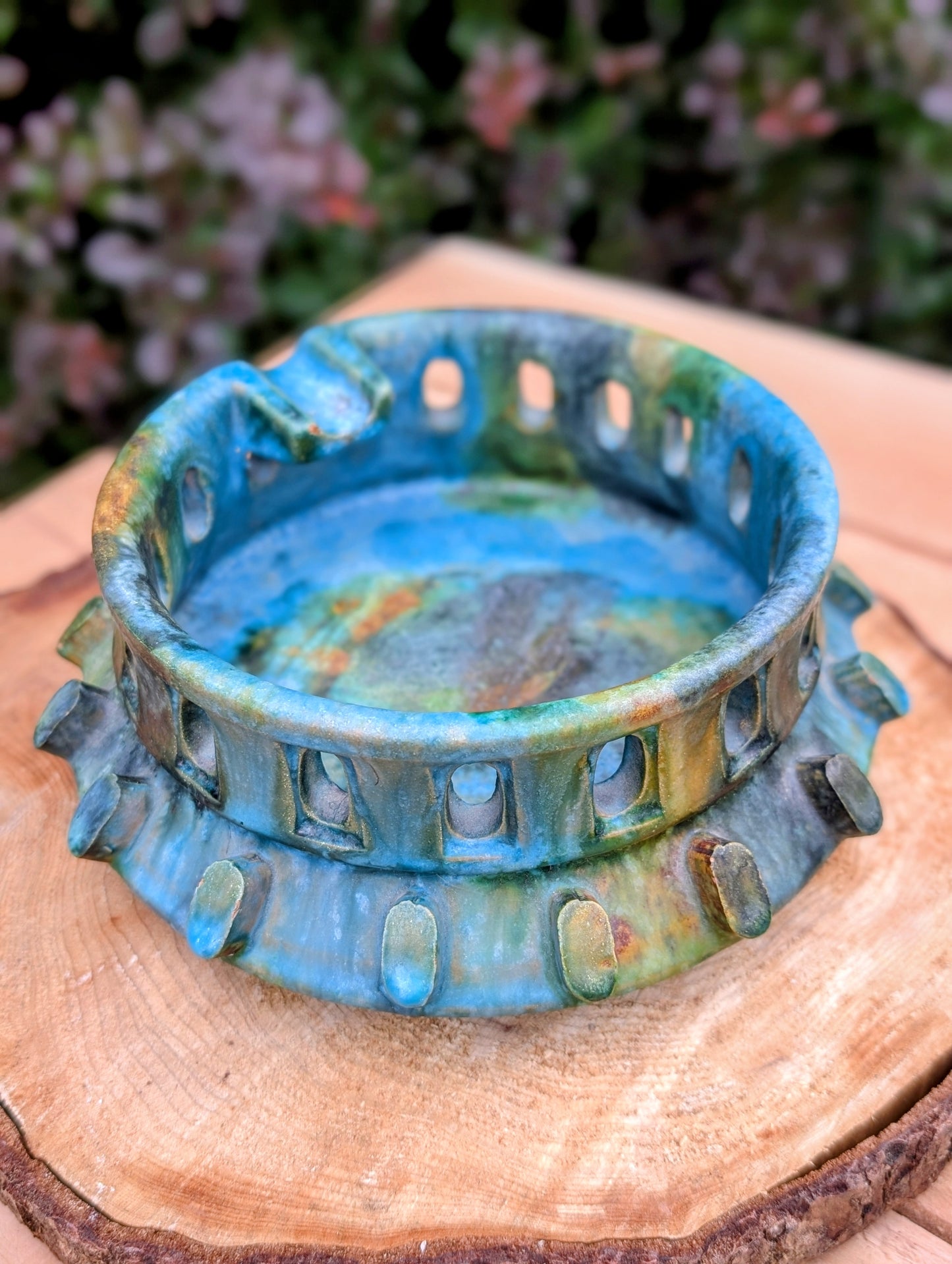 An authentic Alvino Bagni Italian art pottery ashtray, attributed to the celebrated Sea Garden collection produced for the American market through Raymor during the late 1960s. Its richly layered volcanic glaze and sculptural form make it equally stunning as a decorative bowl, catchall, or collectible Mid-Century Modern accent.