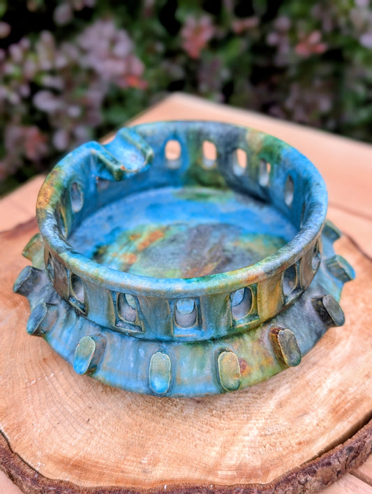 An authentic Alvino Bagni Italian art pottery ashtray, attributed to the celebrated Sea Garden collection produced for the American market through Raymor during the late 1960s. Its richly layered volcanic glaze and sculptural form make it equally stunning as a decorative bowl, catchall, or collectible Mid-Century Modern accent.