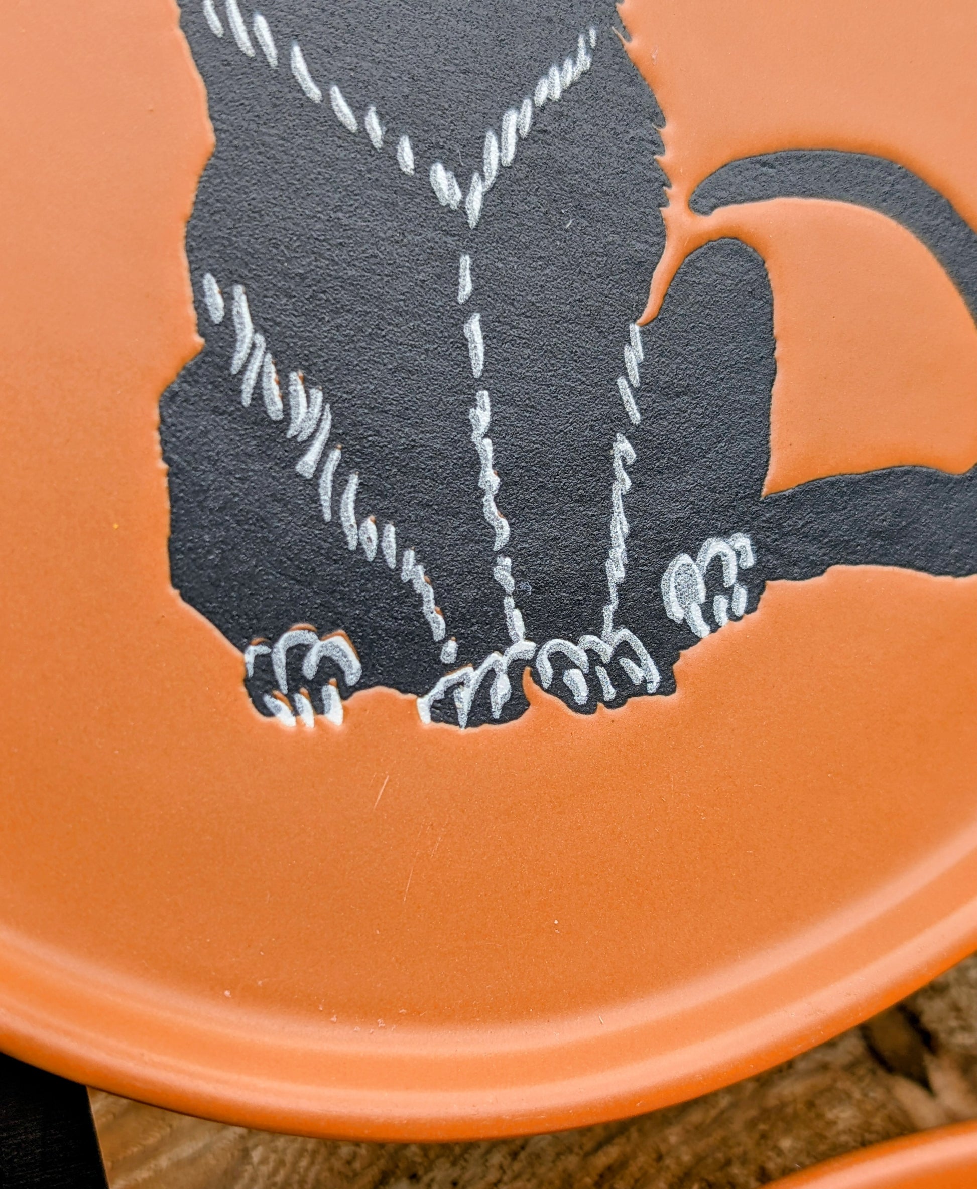 Celebrate the cozy charm of autumn with this whimsical Threshold™ Black Cat Stoneware Plate. Perfect as a snack plate, jewelry dish, decorative coaster, or seasonal accent, each plate is sold individually, with a matching pair available while supplies last.