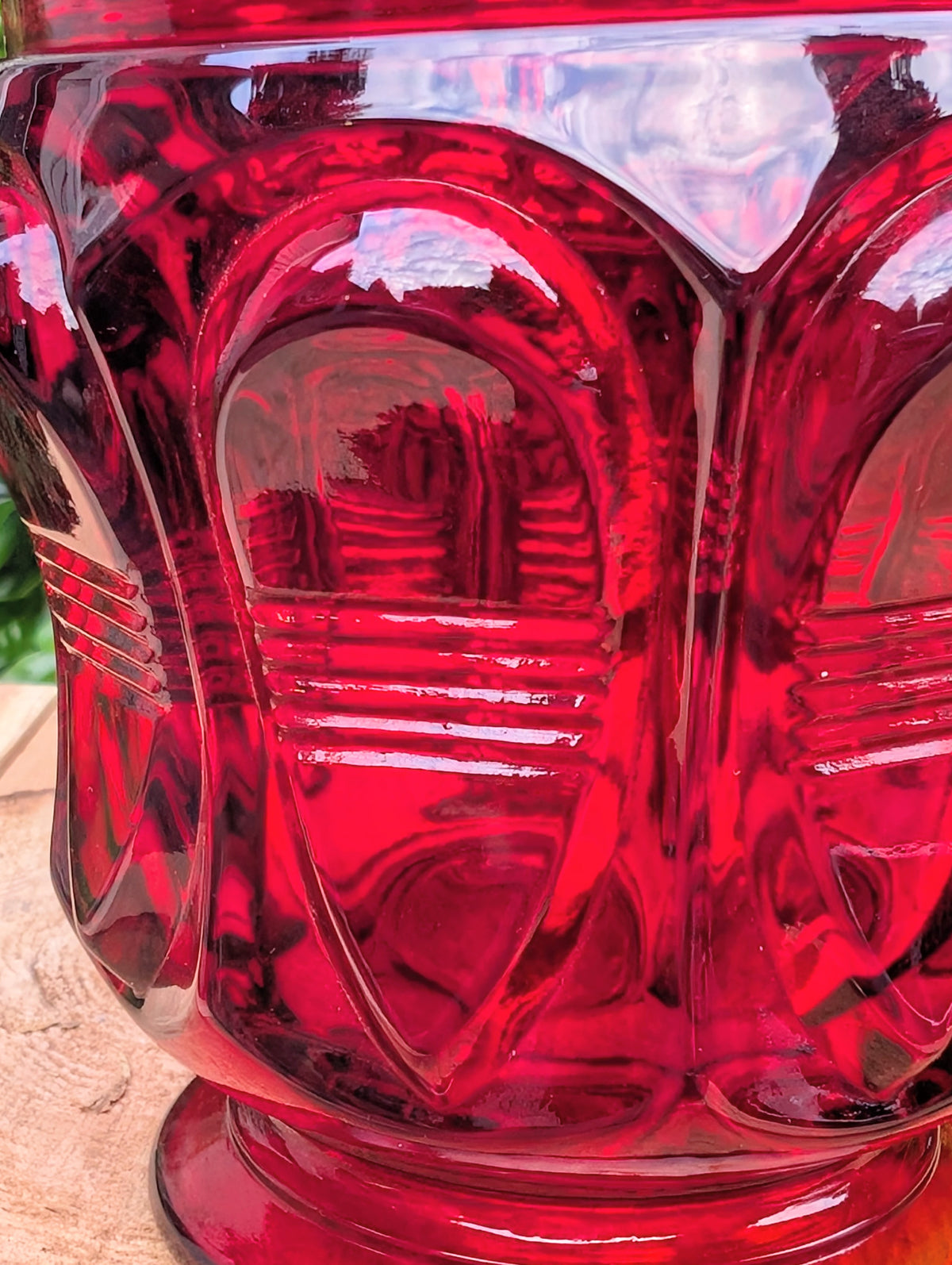 Add timeless elegance to your home with this authentic 1980s Fenton Ruby Red Barred Teardrop Covered Candy Dish. Rich jewel-toned pressed glass, exceptional craftsmanship, and the verified 1980s Fenton maker's mark make this a beautiful display piece for collectors and vintage décor enthusiasts alike.
