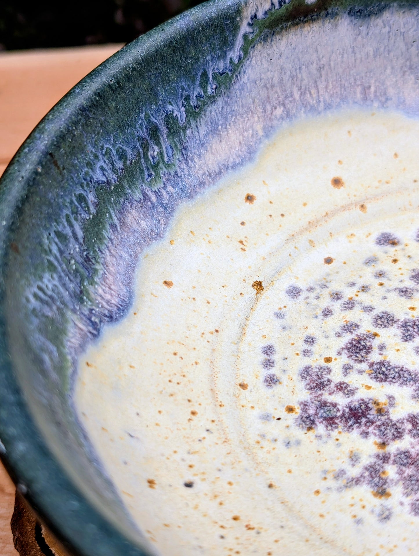 A beautifully handcrafted studio pottery bowl signed by Steve & Johnna and dated 1993. Featuring layered forest green, lavender-blue, and cream glazes, this wheel-thrown stoneware piece embodies the timeless beauty of American studio ceramics and is equally suited for everyday use or display.