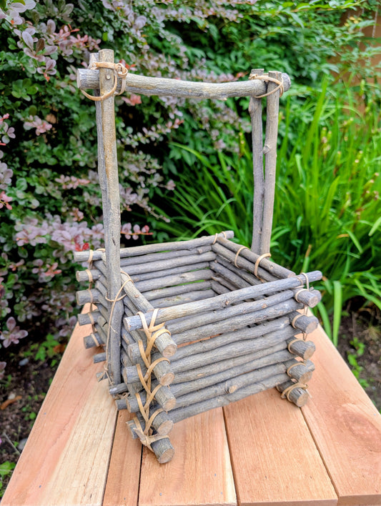 A beautifully handcrafted twig gathering basket that brings rustic warmth and natural texture to your home or garden. Perfect for displaying potted plants, seasonal décor, dried botanicals, or everyday storage, this versatile basket celebrates timeless craftsmanship and Pacific Northwest-inspired living.
