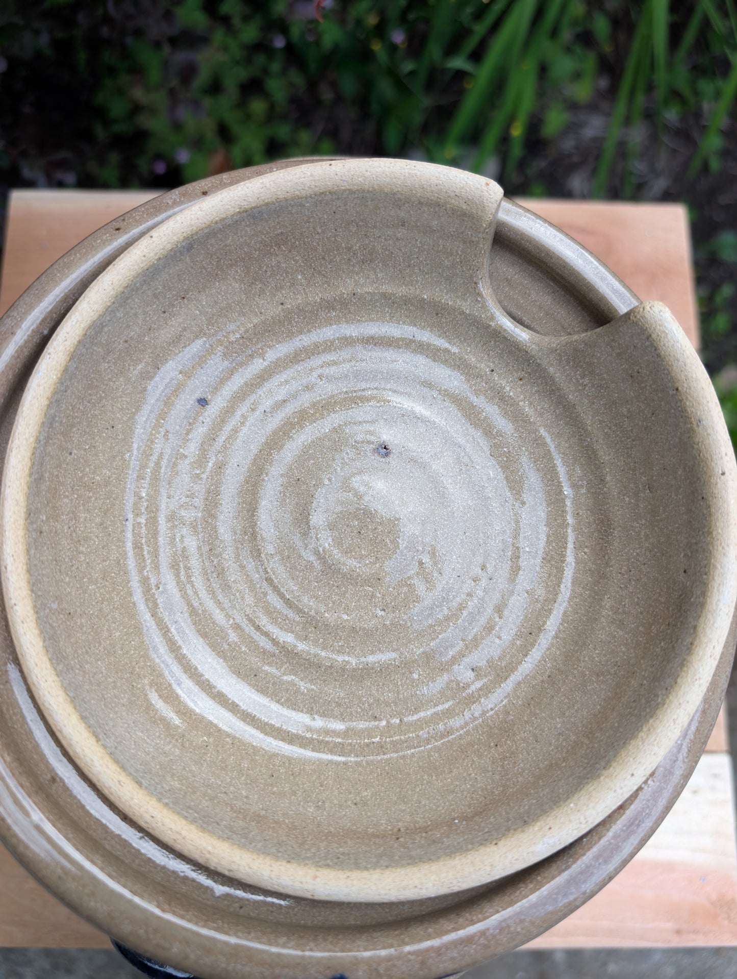 A beautifully handcrafted studio pottery tureen featuring a fitted lid, integrated handles, and a flowing cobalt blue glaze over warm oatmeal stoneware. Both functional and decorative, this artisan serving piece brings timeless craftsmanship and organic beauty to the table