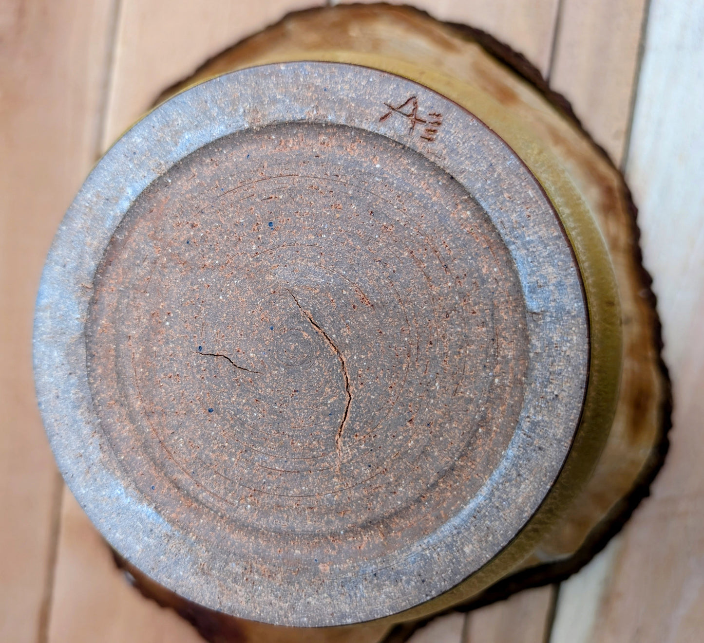 A beautifully hand-thrown studio pottery pouring bowl featuring a soft blue-green celadon glaze over warm buff stoneware. Equally suited for serving, light kitchen use, or display, this artisan-made piece celebrates the beauty of handcrafted ceramics and timeless functional design.