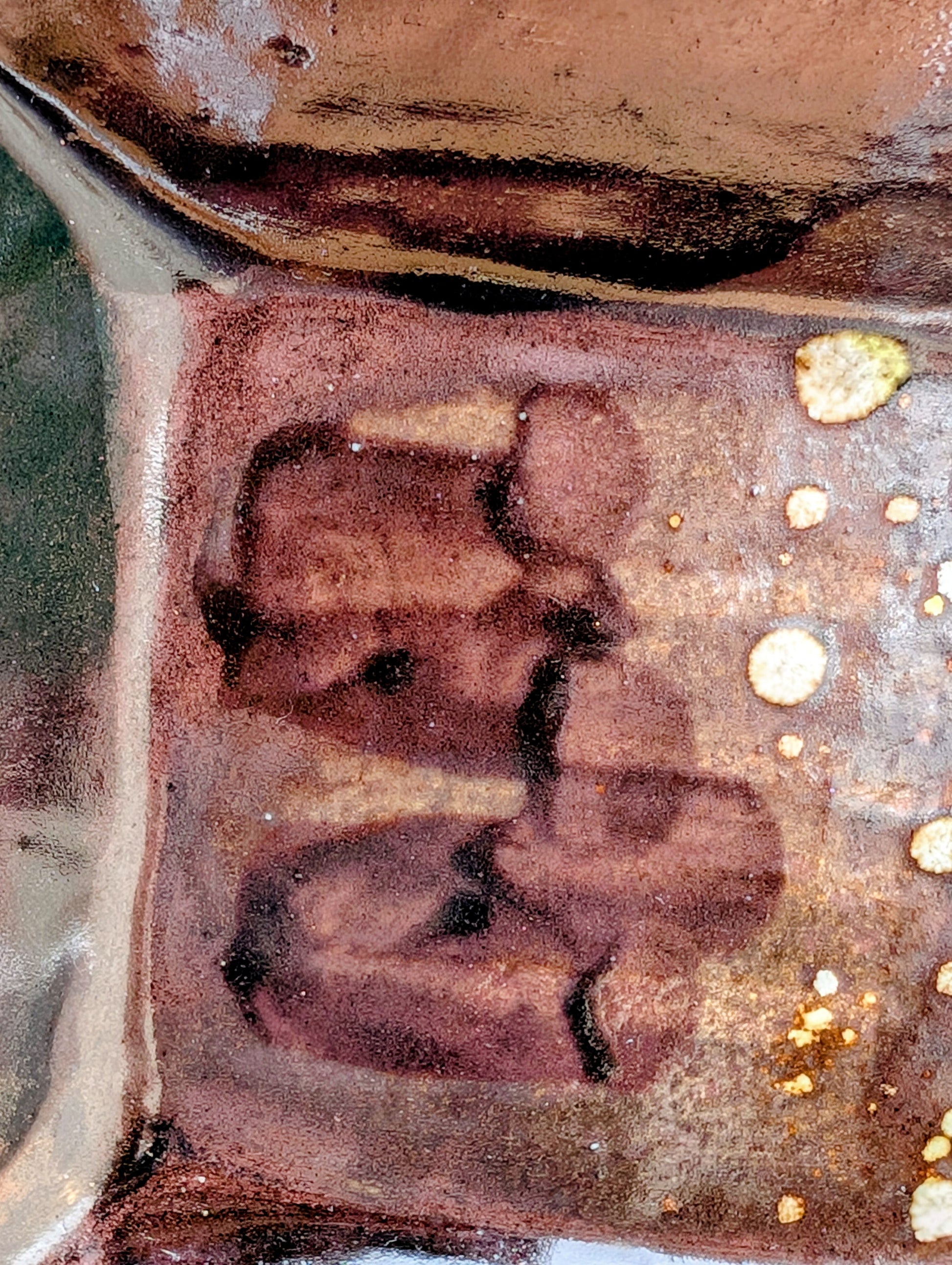 Celebrate the beauty of handcrafted ceramics with this square studio pottery dish featuring layered reactive glazes in rich chocolate brown, gray, olive, cream, and golden crystalline accents. Perfect as a catchall tray, jewelry dish, appetizer plate, or decorative accent, it brings organic warmth to any space.