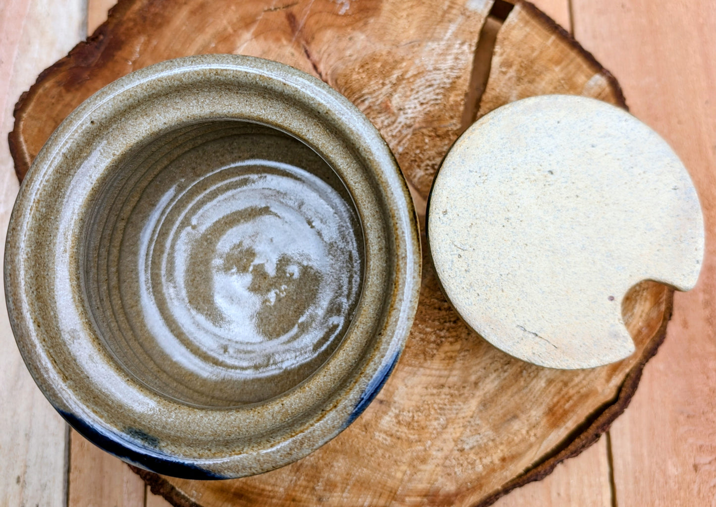 Bring handcrafted warmth to your kitchen with this signed studio pottery lidded jam pot featuring richly layered cobalt blue, olive, brown, and tan glazes. Perfect for serving honey, preserves, sugar, or favorite condiments, this artisan stoneware piece is both beautiful and functional.