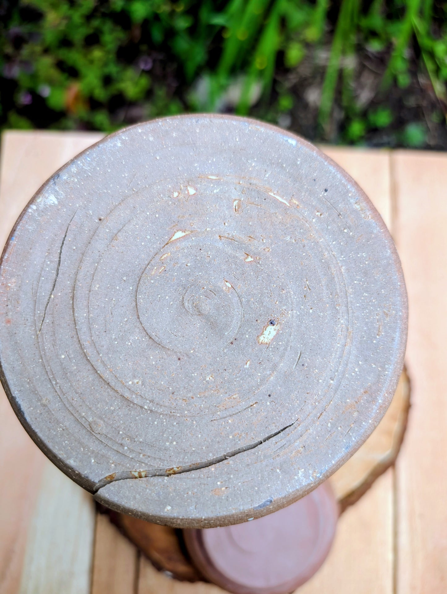 Bring warmth and handcrafted character to your kitchen with this wheel-thrown stoneware canister. Finished in a soft creamy-white glaze with subtle iron speckling, this timeless storage vessel blends rustic craftsmanship with modern organic design.