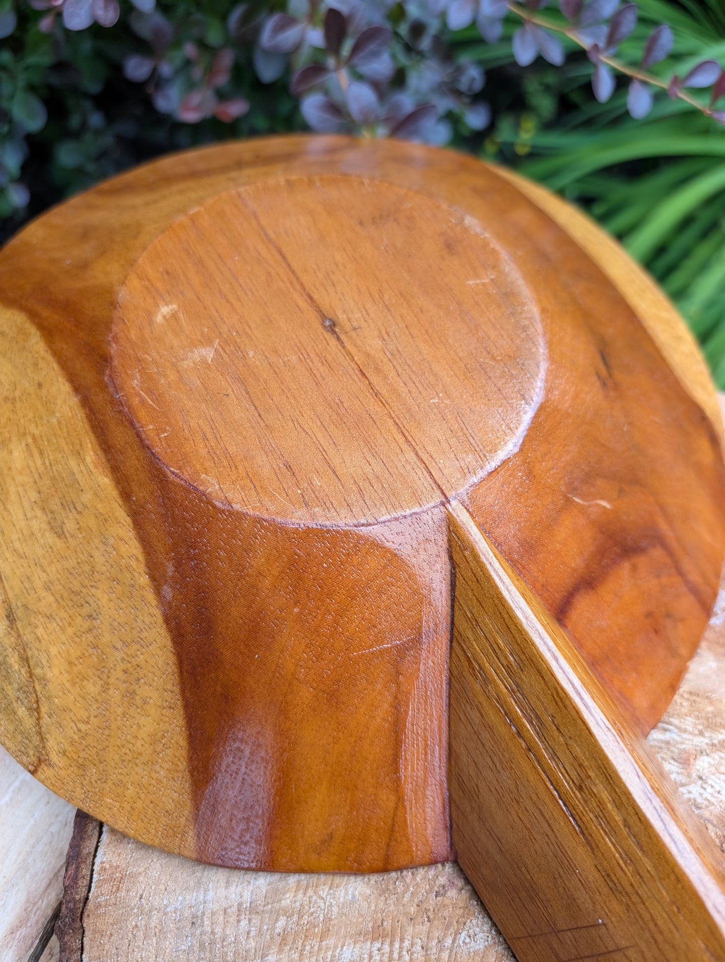 Serve with timeless style using this hand-carved Monkey Pod wood double serving tray. Crafted from a single piece of richly grained hardwood, its sculptural silhouette makes it equally beautiful as a serving piece or decorative centerpiece.