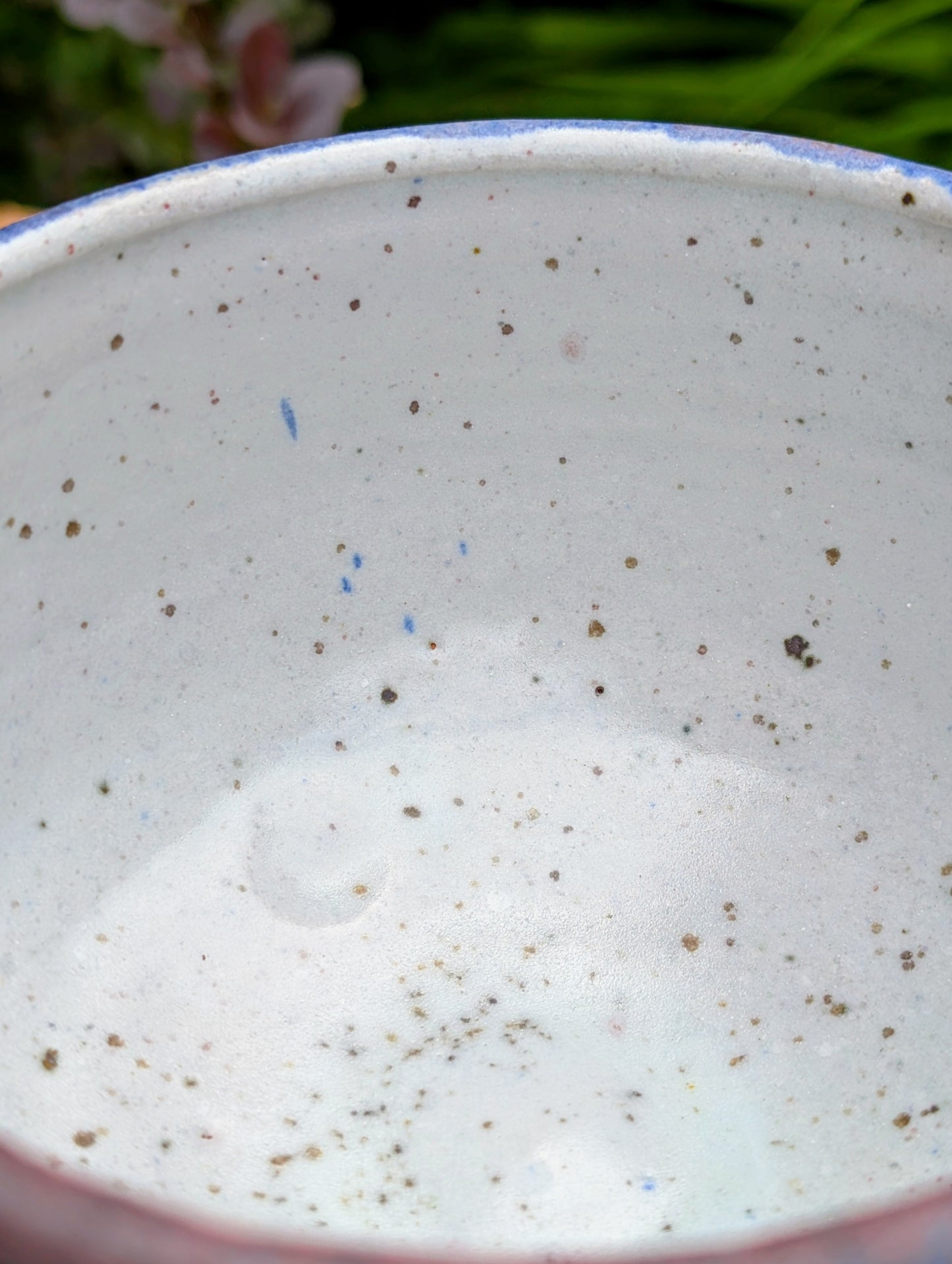 Bring handcrafted artistry to your home with this small footed studio pottery bowl featuring layered reactive glazes in purple, blue, charcoal, and earthy brown. Wheel-thrown from high-fired stoneware, its one-of-a-kind finish makes it equally beautiful as functional tableware or decorative art.