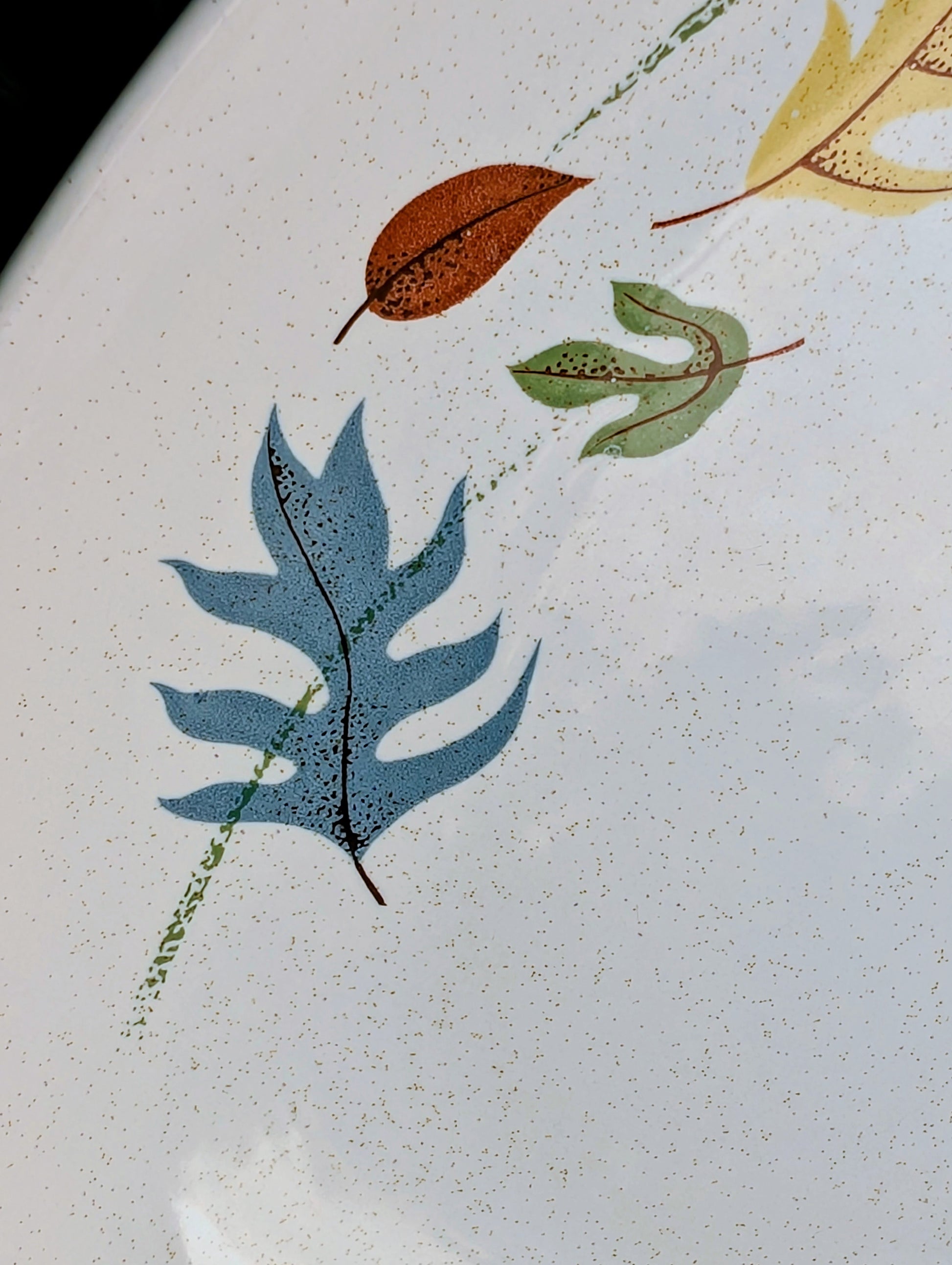 Celebrate the warmth of the harvest season with this authentic vintage Franciscan Ware Autumn Leaves oval serving platter. Made in California during the mid-century era, this beautifully preserved earthenware piece brings timeless craftsmanship and nature-inspired charm to both everyday dining and seasonal entertaining.