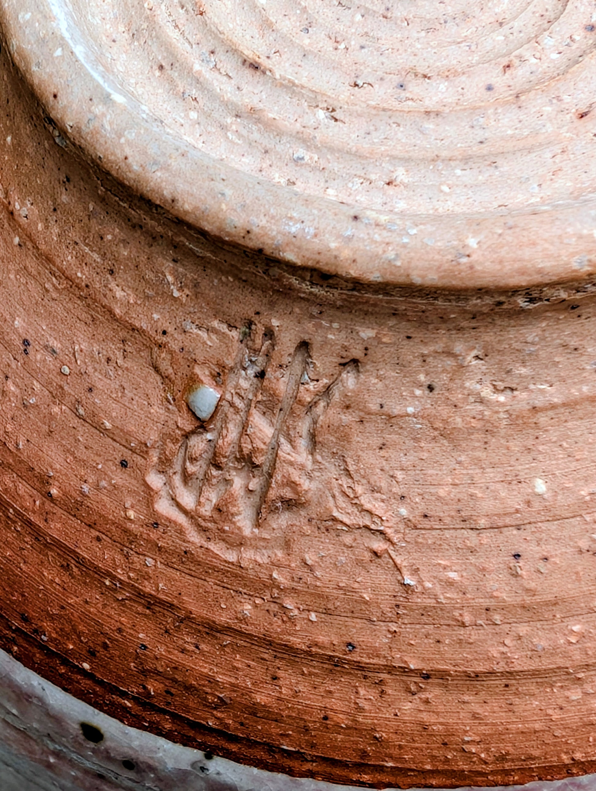 Handcrafted with timeless simplicity, this signed studio pottery serving bowl pairs a soft celadon-gray glaze with a warm iron-rich stoneware body. Its versatile size and understated design make it equally beautiful for serving, display, or everyday living.