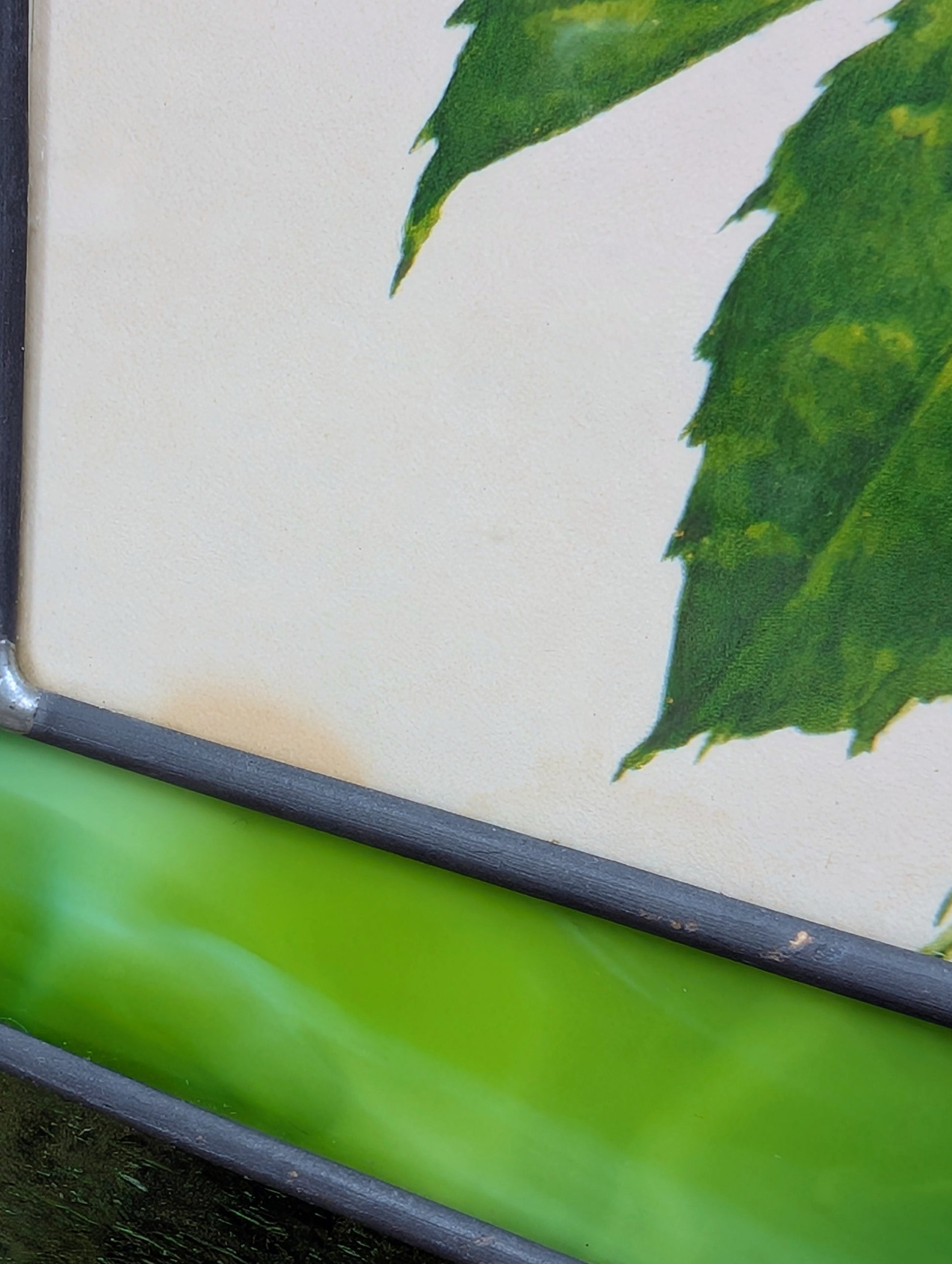 Bring the beauty of a hummingbird in bloom into your home with this handcrafted stained glass hanging panel. Featuring vibrant textured art glass surrounding a detailed hummingbird and hibiscus centerpiece, it catches natural light beautifully and adds year-round color to any window, sunroom, or garden-inspired space.