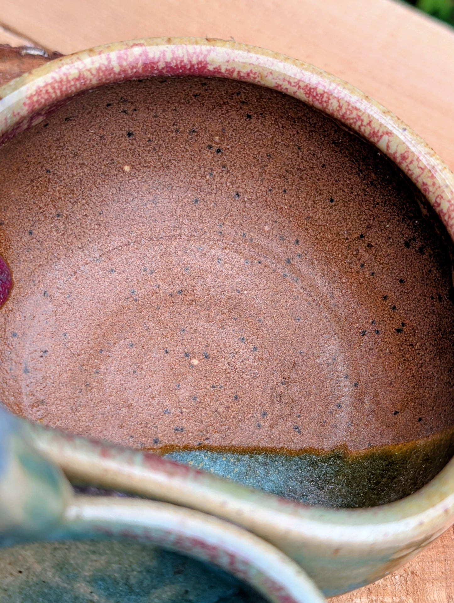 Beautifully handcrafted and artist signed, this three-bowl stoneware condiment server combines sculptural artistry with everyday functionality. Finished in layered seafoam, aqua, moss, and earthy glazes, it brings timeless craftsmanship and Pacific Northwest-inspired beauty to entertaining.