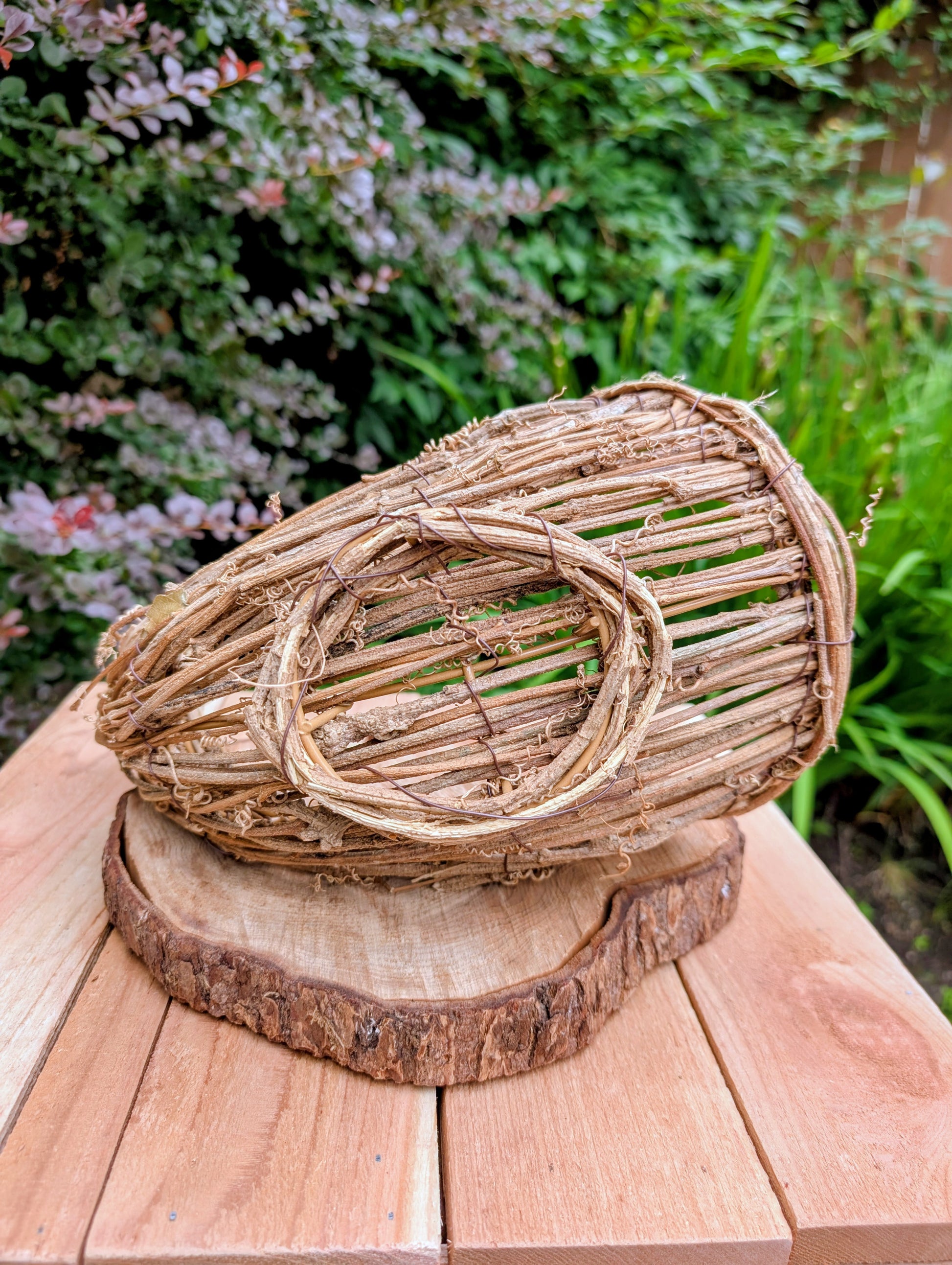 Bring the warmth of the harvest season into your home with this Napco Imports Natural Look Cornucopia. Crafted from natural grapevine and twigs over a sturdy wire frame, it makes a beautiful centerpiece for autumn decorating, seasonal displays, or rustic home décor.